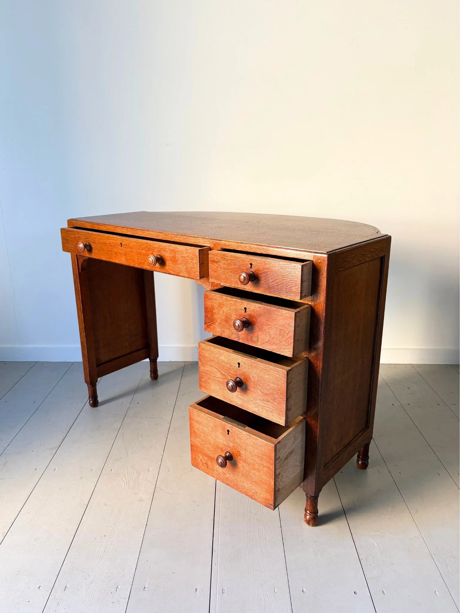 Vintage Heals Desk housing five storage drawers with turned oak handles - Bureau Bruton Antiques and Vintage