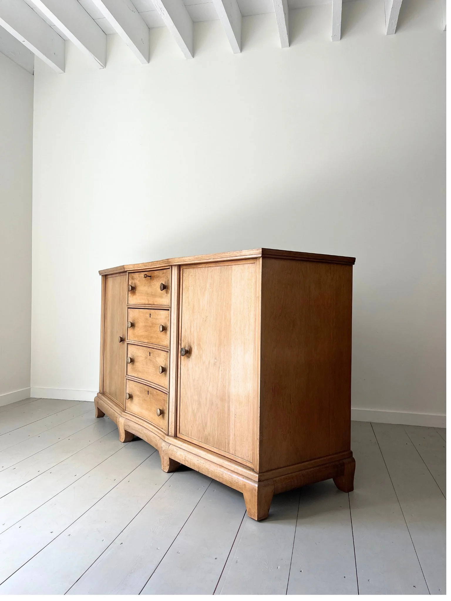 This Italian credenza displays a rarified simplicity with subtle art nouveau & art deco design influences - Bureau Bruton