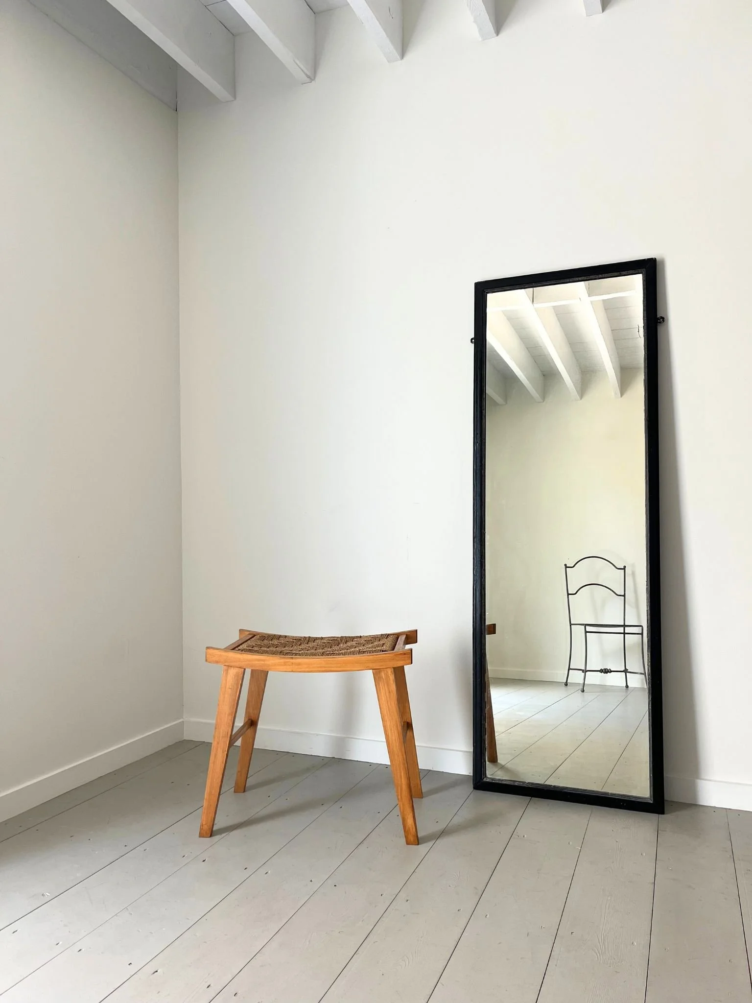 Bauhaus style woven stool, paired here with an early 20th century tailor's mirror, perfect for a dressing room - Bureau Bruton