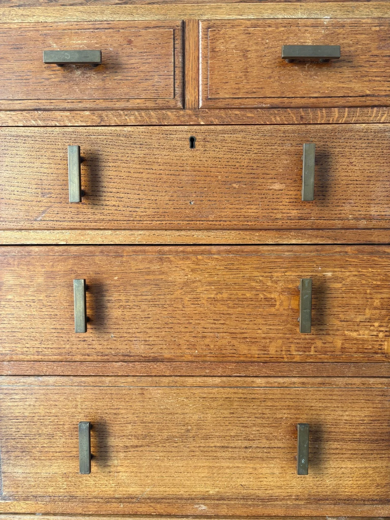 Detail of the geometric linear drawer handles in brass, on our Art Deco Chest by Waring and Gillow - Bureau Bruton