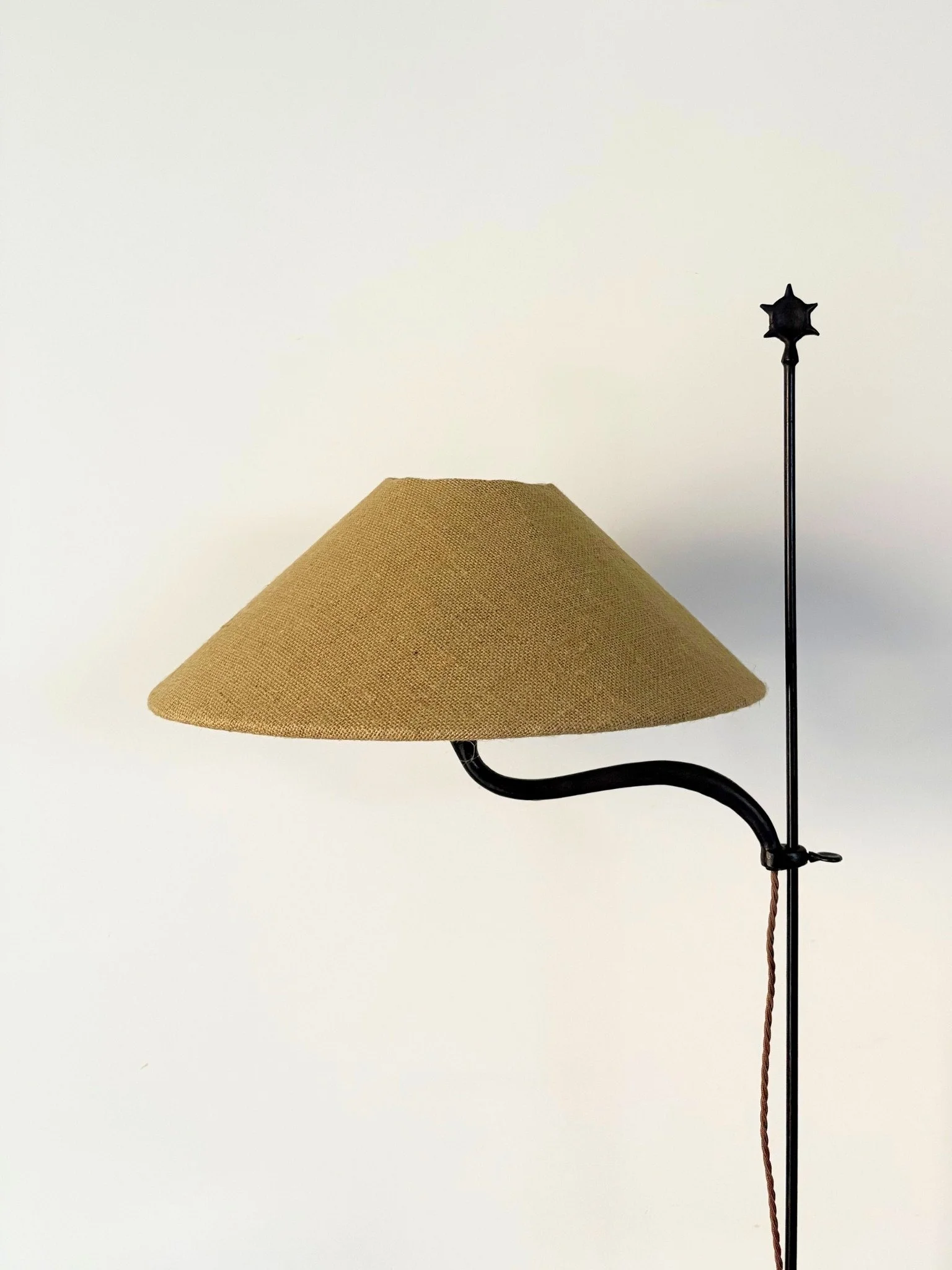 A wrought iron artisanal French 20th century lamp with a super slim stem and swan neck bulb holder - Bureau Bruton