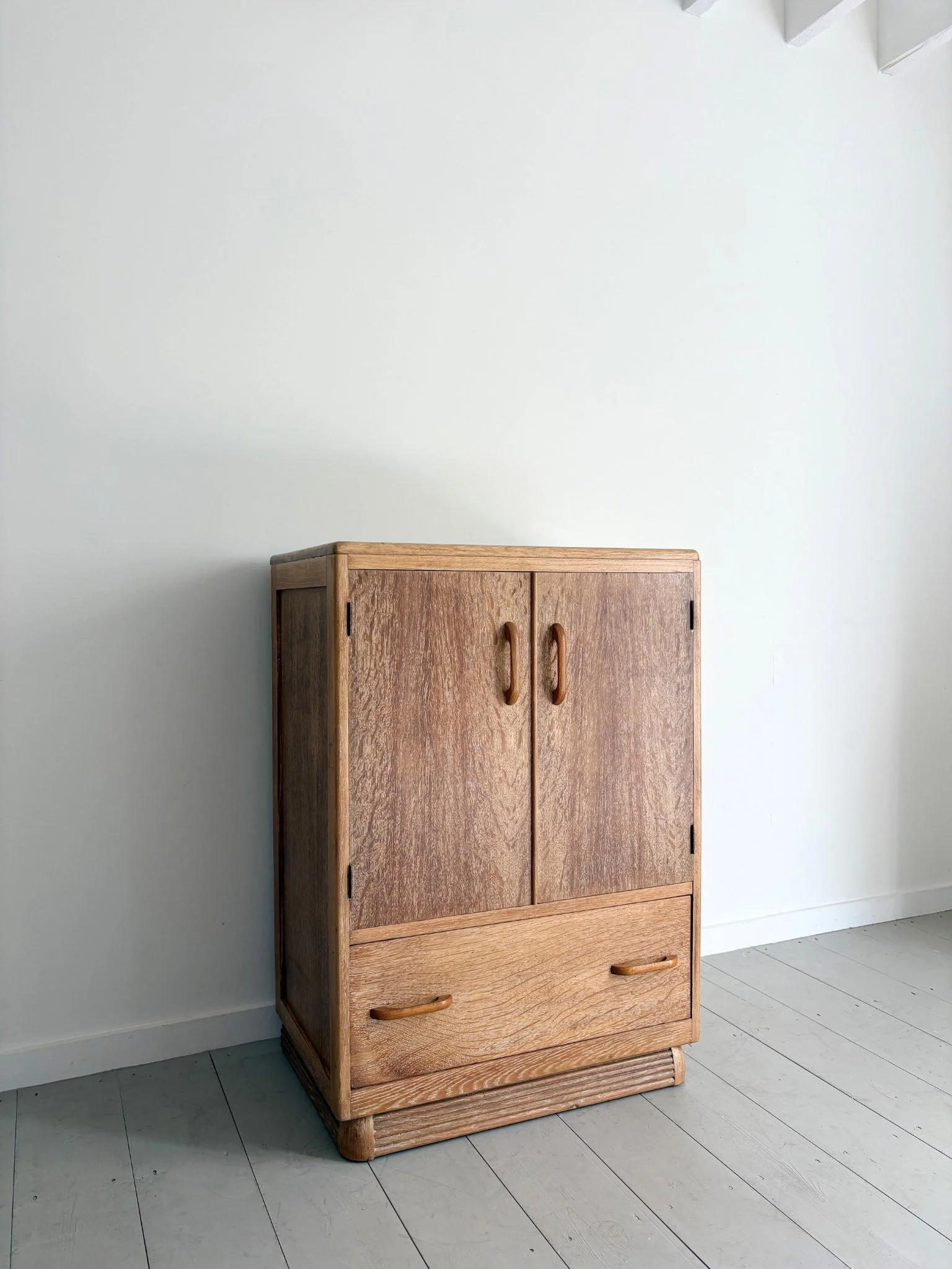 A 1930s limed oak tall boy with wonderful yet simple detailing - Bureau Bruton