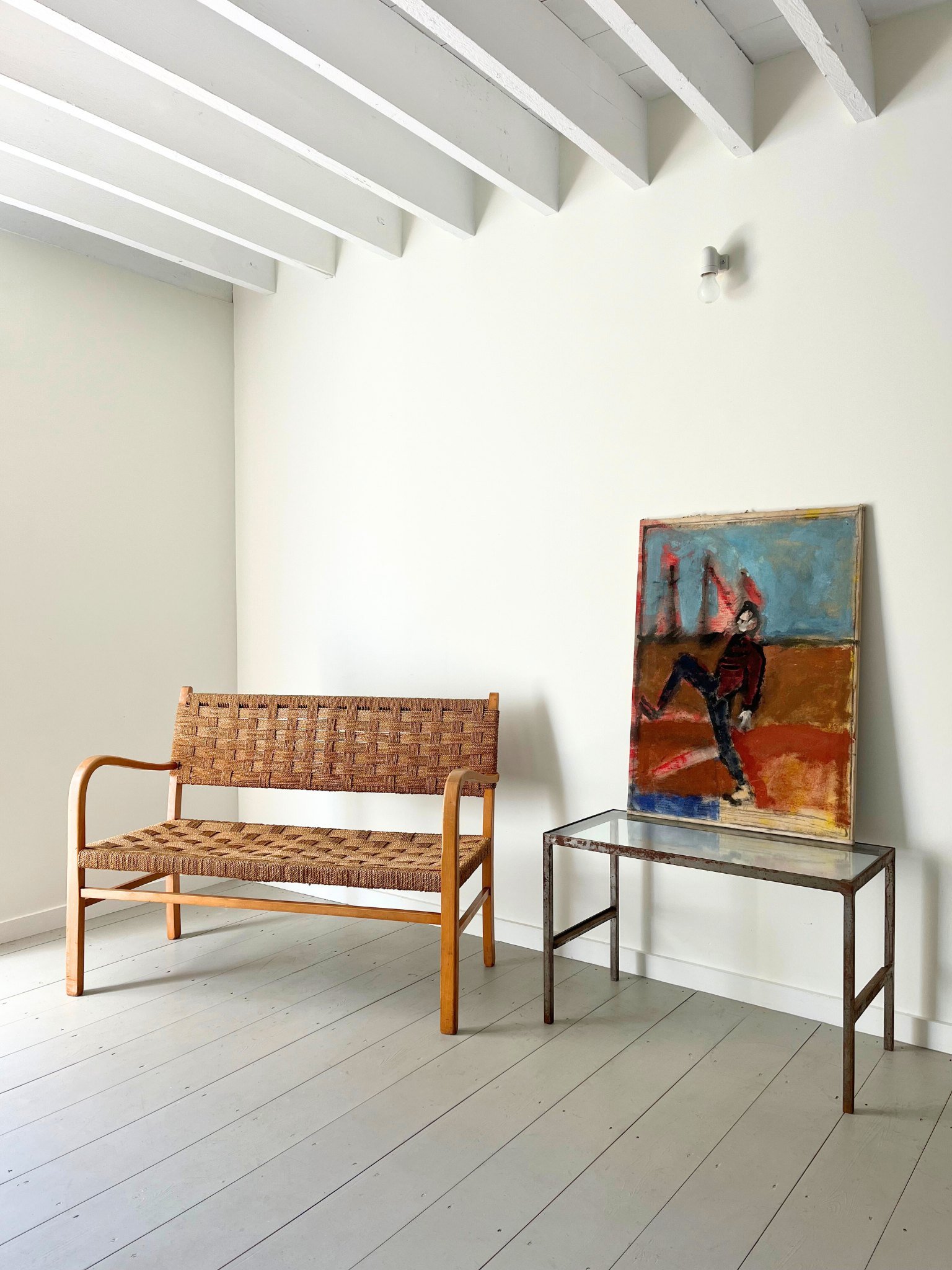 This dynamic 20th century oil painting sits next to an early Modernist bench with woven chequerboard seat - Bureau Bruton Antiques and Vintage Gallery and Shop