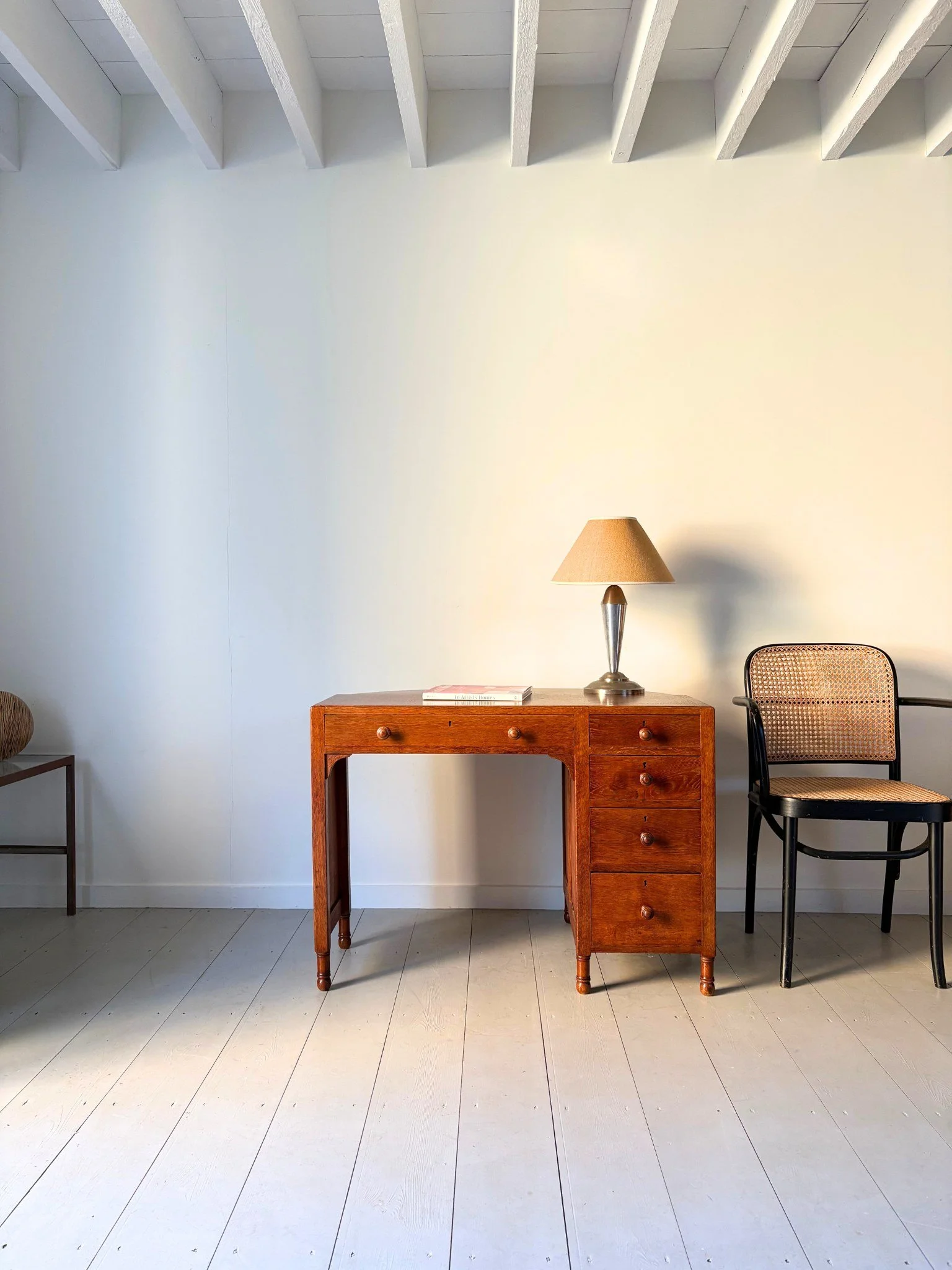 A Vintage Demi Lune Desk In Oak With Turned Details by Heals of London - Bureau Bruton
