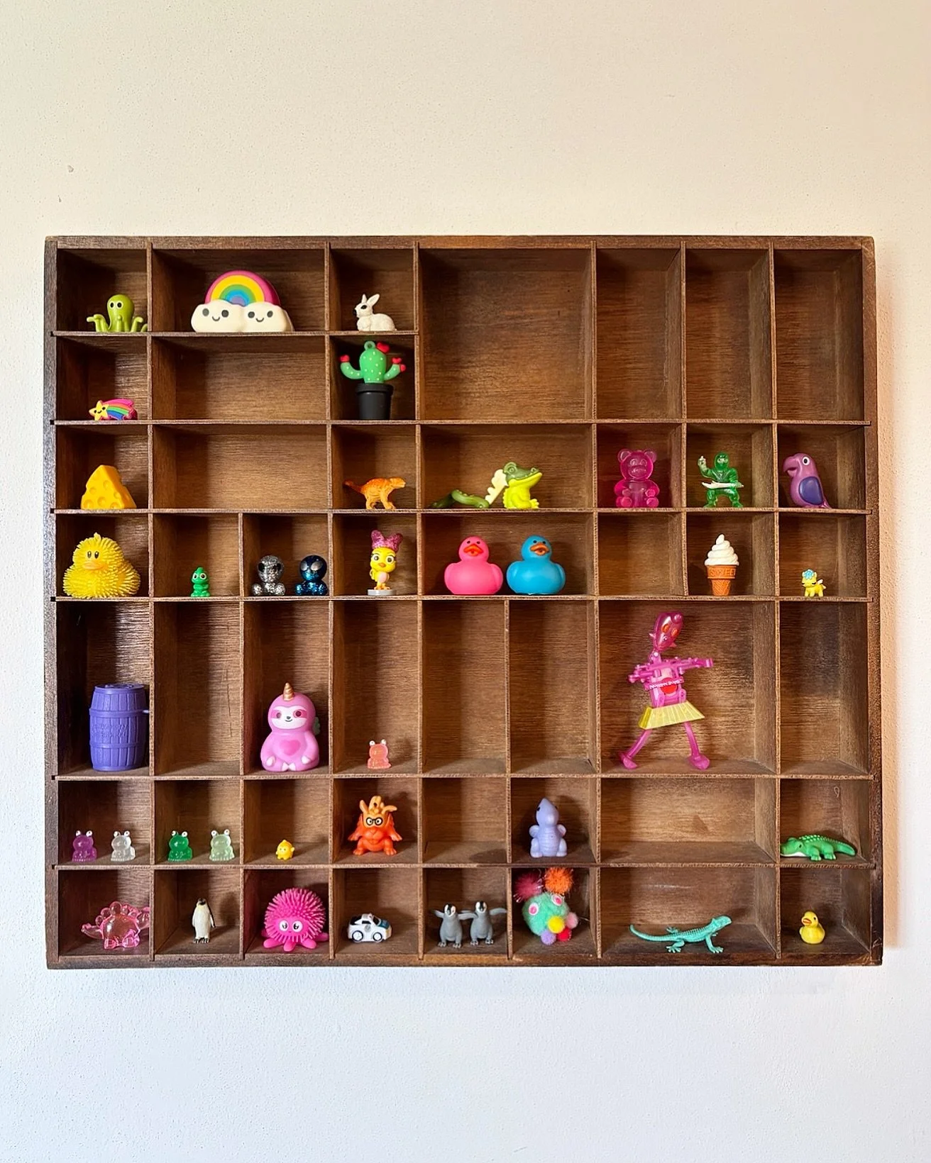 Contrary to popular belief, I love when clients have a passion for a hobby or collection. It’s a beautiful way to celebrate what sparks joy. The key is giving those pieces a display that honors their value.
When I saw this in a client’s