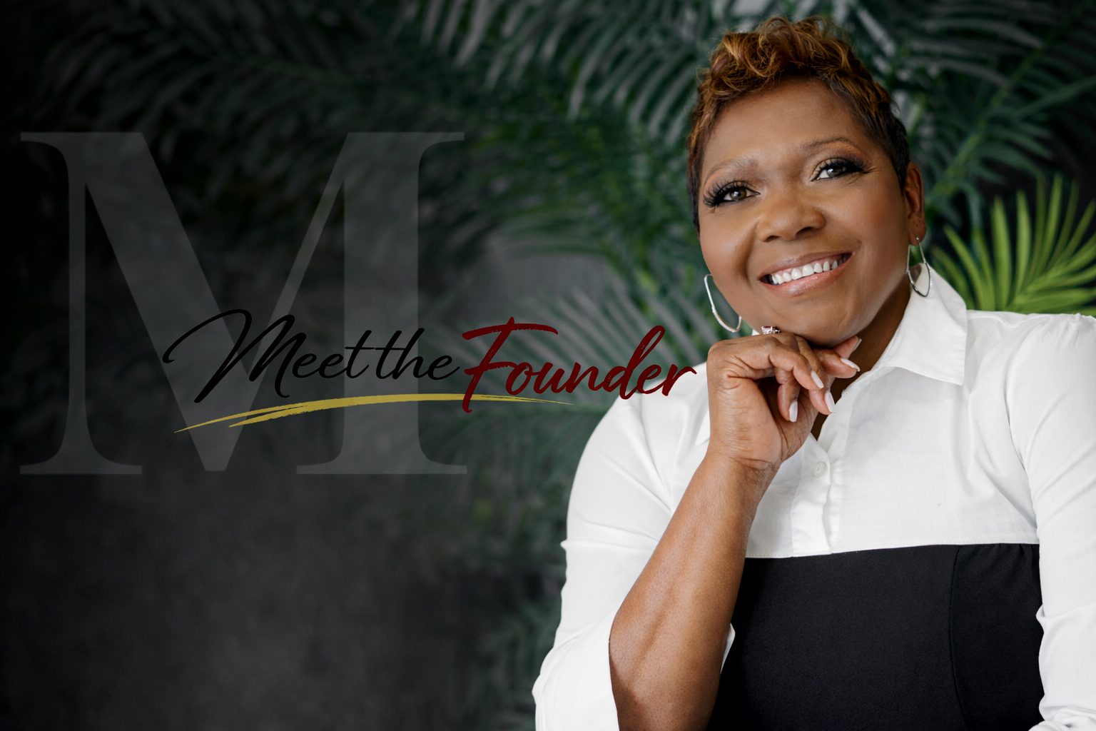 A smiling woman with short, curly hair, wearing a white shirt with black bottom, earrings, and a ring, posing with her chin resting on her hand against a green leafy background. The text overlay says 'Meet the Founder' with a stylized 'M' in the background.