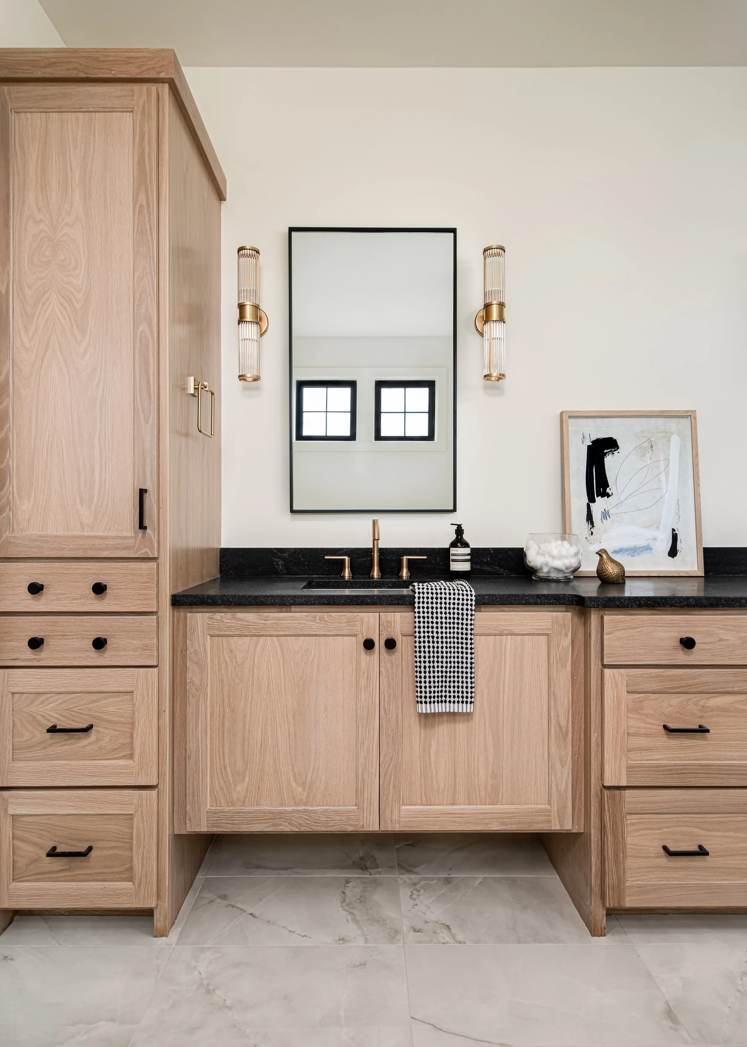 White oak bathroom vanity with Negresco granite