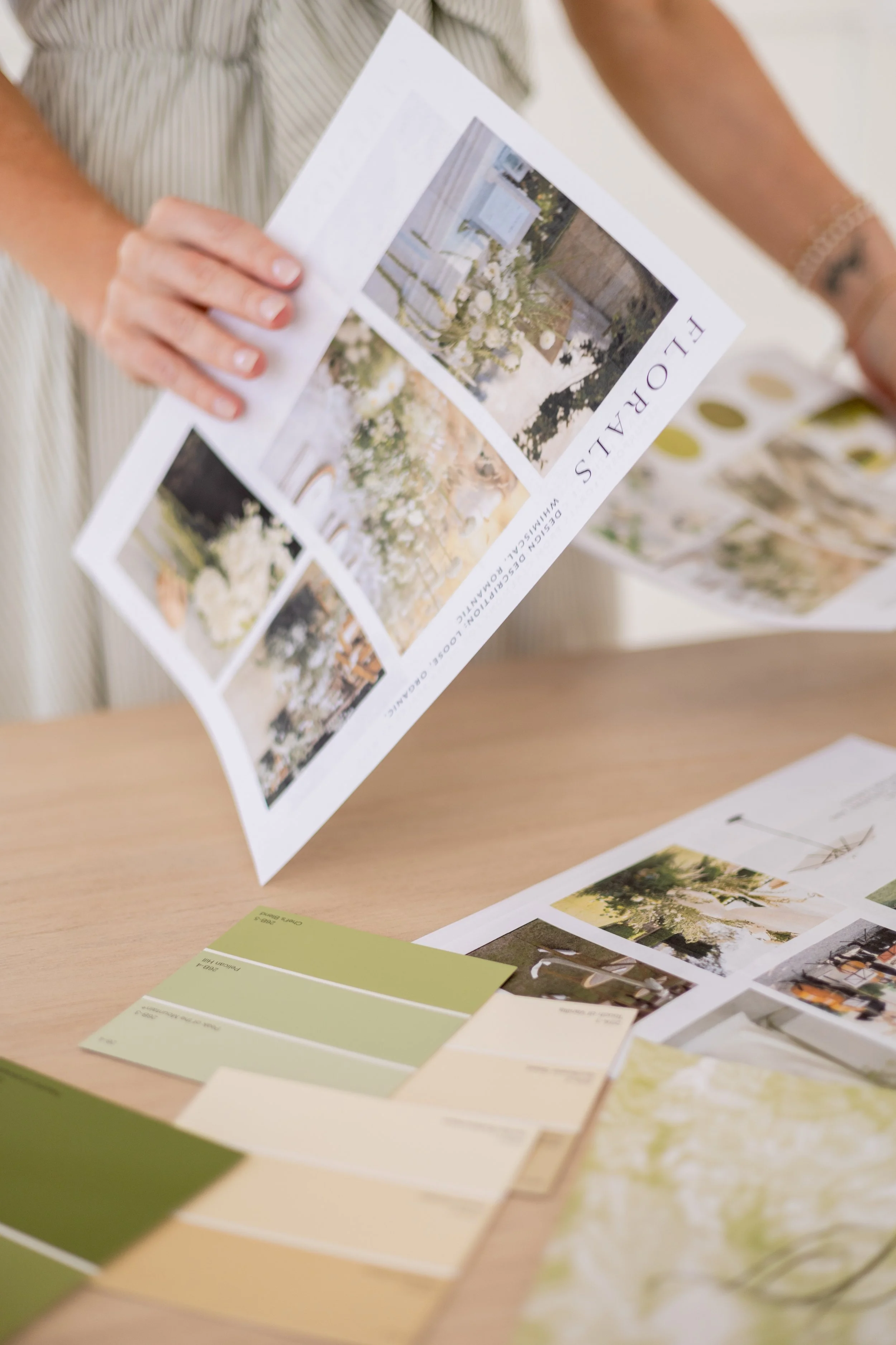 Georgia wedding designer comparing color swatches