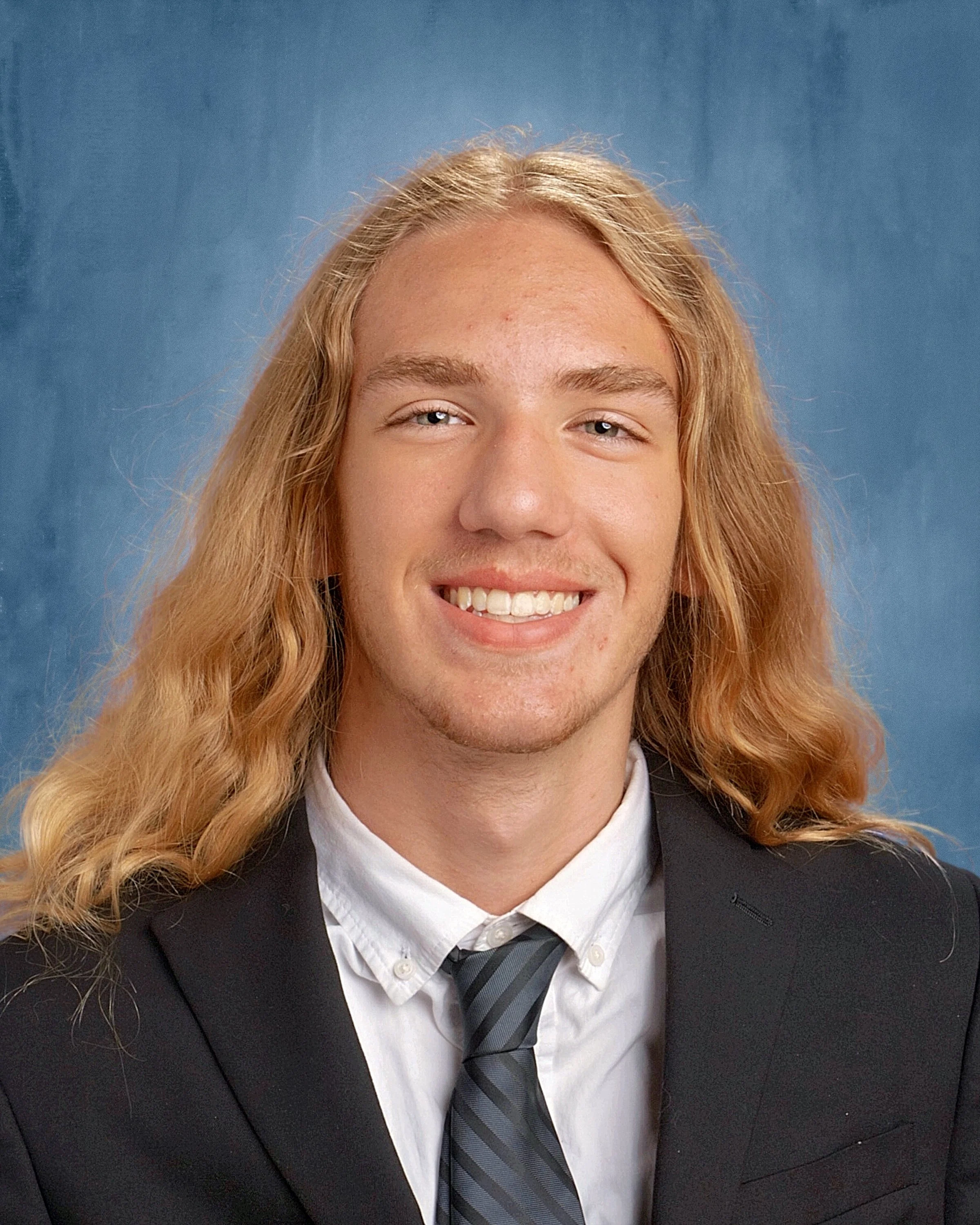 Micah Senior Portrait 1 2026.jpg