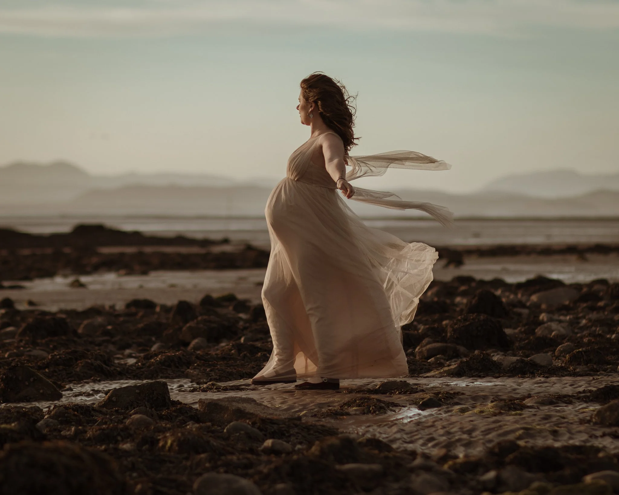 A golden hour maternity session at Half Moon Bay with Emily