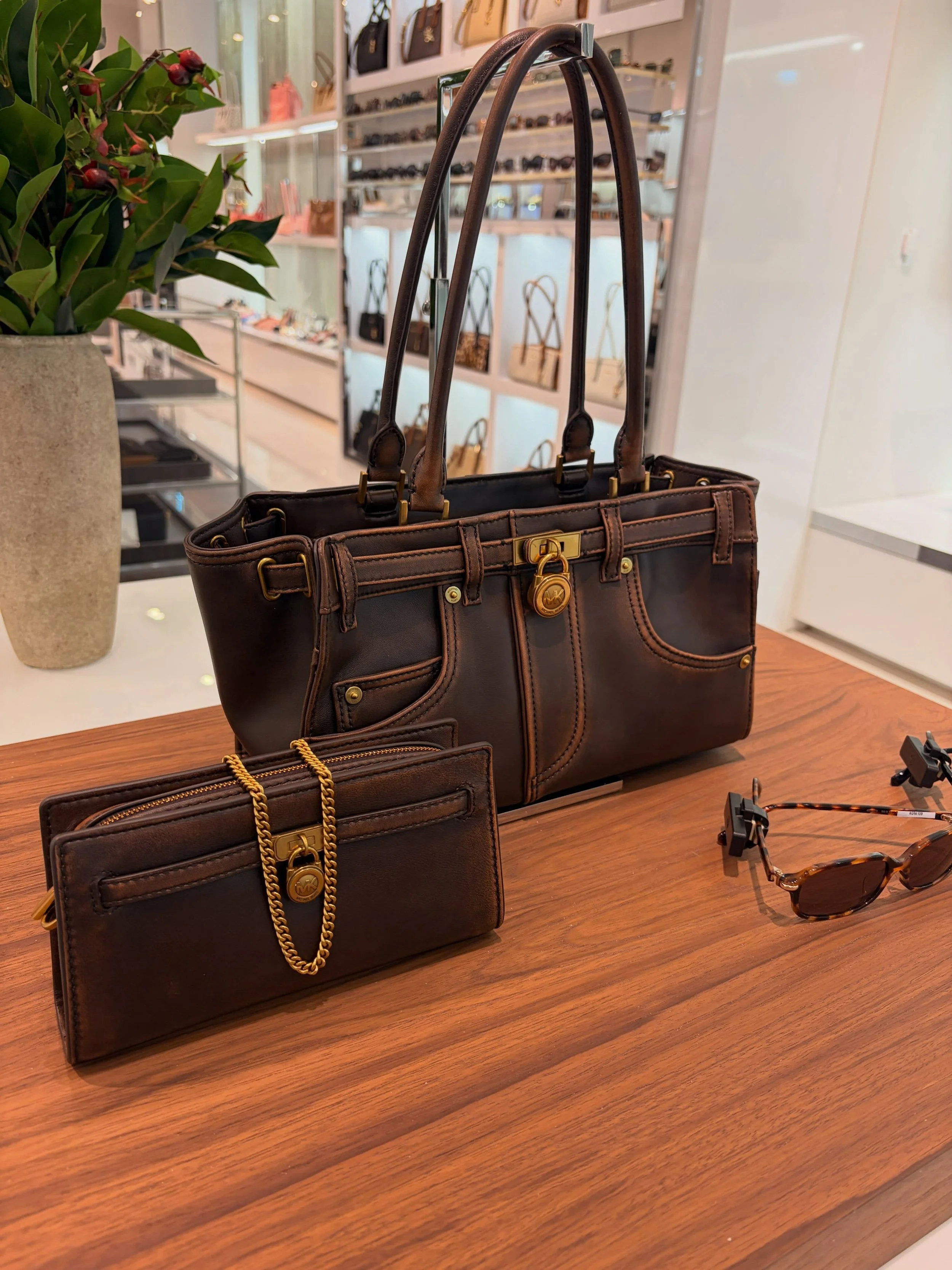 A moment please for the Hamilton Moderne Burnished Leather Satchel 🙌. This beautiful burnished finish is resonating through Michael Kors just in time for fall. 🍂 Stop by the store to discover the latest fall looks and enjoy 25% off select full-pric