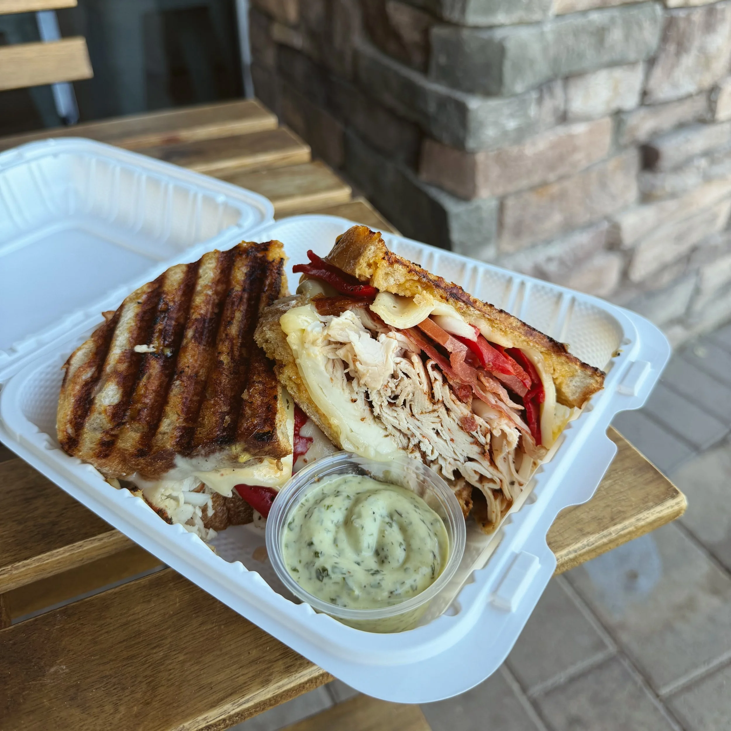 Introducing The Smokehouse Italiano 🥪

Blackened turkey, bacon, provolone, fresh mozzarella, roasted Italian pepper, sweet onion, and Roma tomato all brought together with our smoked honey Sicilian aioli. 

Served with a basque basil dipping sauce o