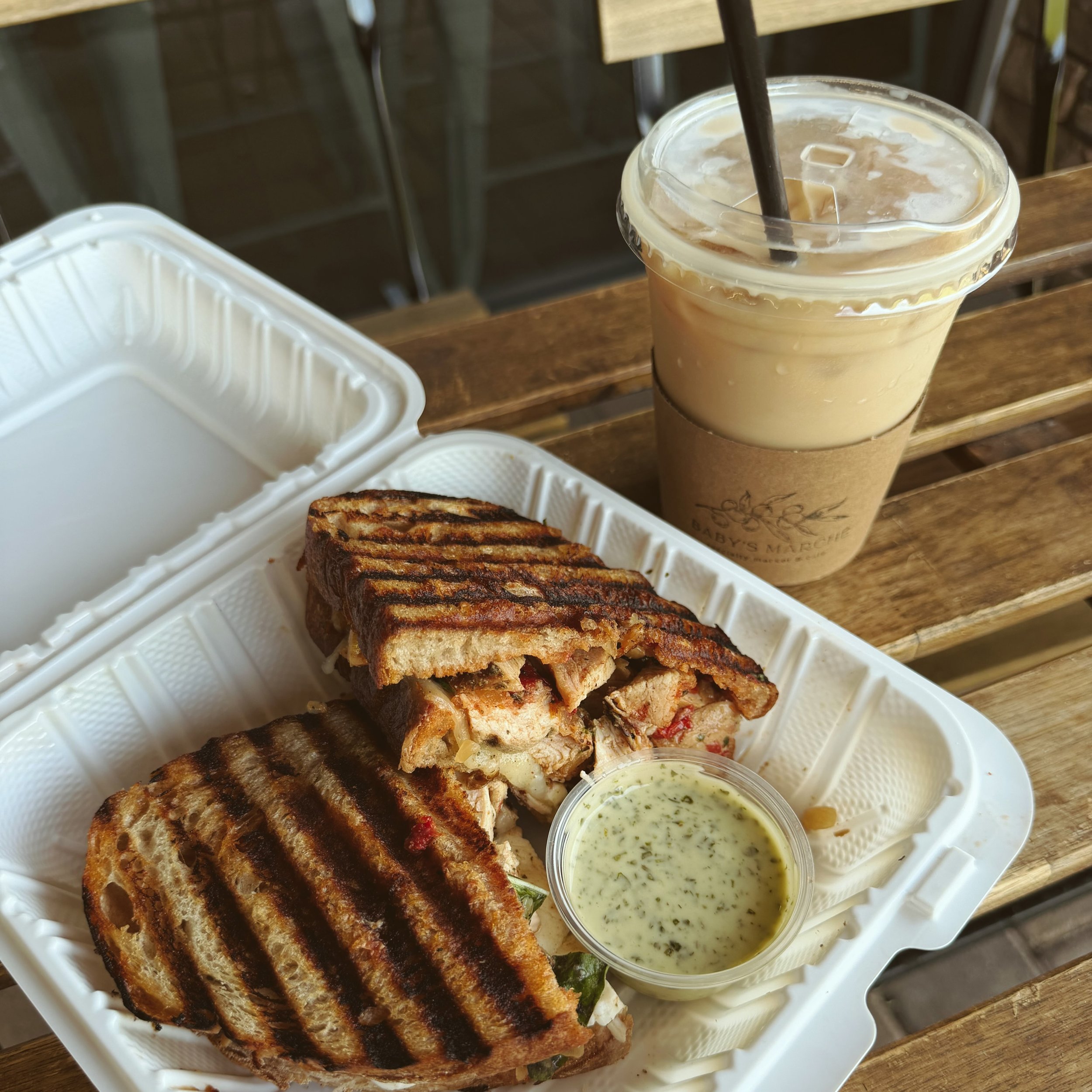 This week&rsquo;s special: &ldquo;The Smoked Parm&rdquo;

Smoked chicken breast
Caramelized onions
Fresh mozzarella
Provolone
Parmesan
Tomato aioli
Fresh basil

Pressed panini, served with a side of herbed dressing.

Available this week or until we s