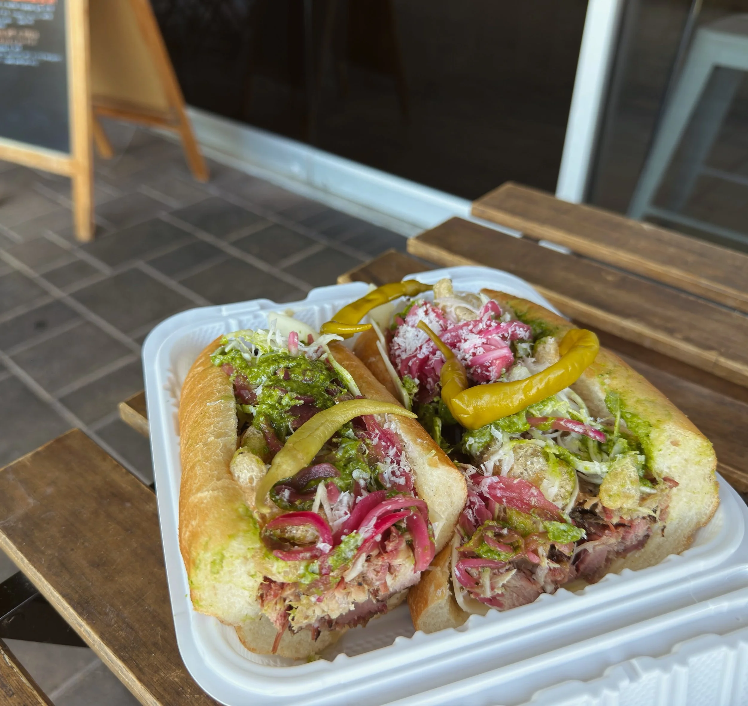 Another @tallowandsmokebbq collab at Baby&rsquo;s March&eacute; 

The Crackling

8 hour post oak smoked heritage pork 
pork crackling
white cheddar 
fresh grated pecorino cheese
black truffle honey aioli
green cabbage
pickled red onion
guindilla basq