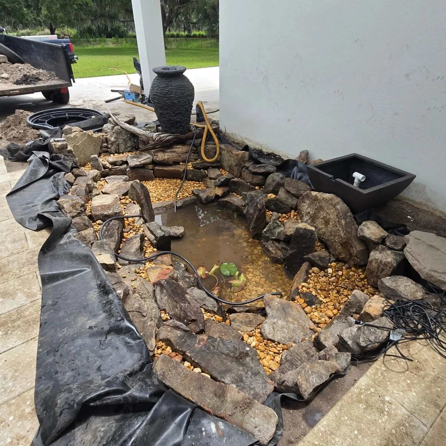 Pond is filling, after lunch, will finish top part of pond and rock the biofalls, going to take a while for it to fill. Will be back tomorrow to get it running and finish a few things. #conleyponds #ponds #waterfalls #peaceful ##relaxation