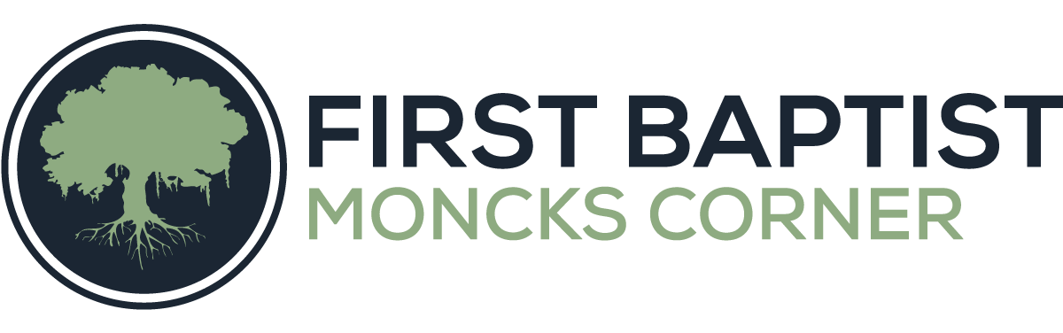 Logo of First Baptist Church Moncks Corner featuring a green tree inside a dark circle and the church name in bold letters.