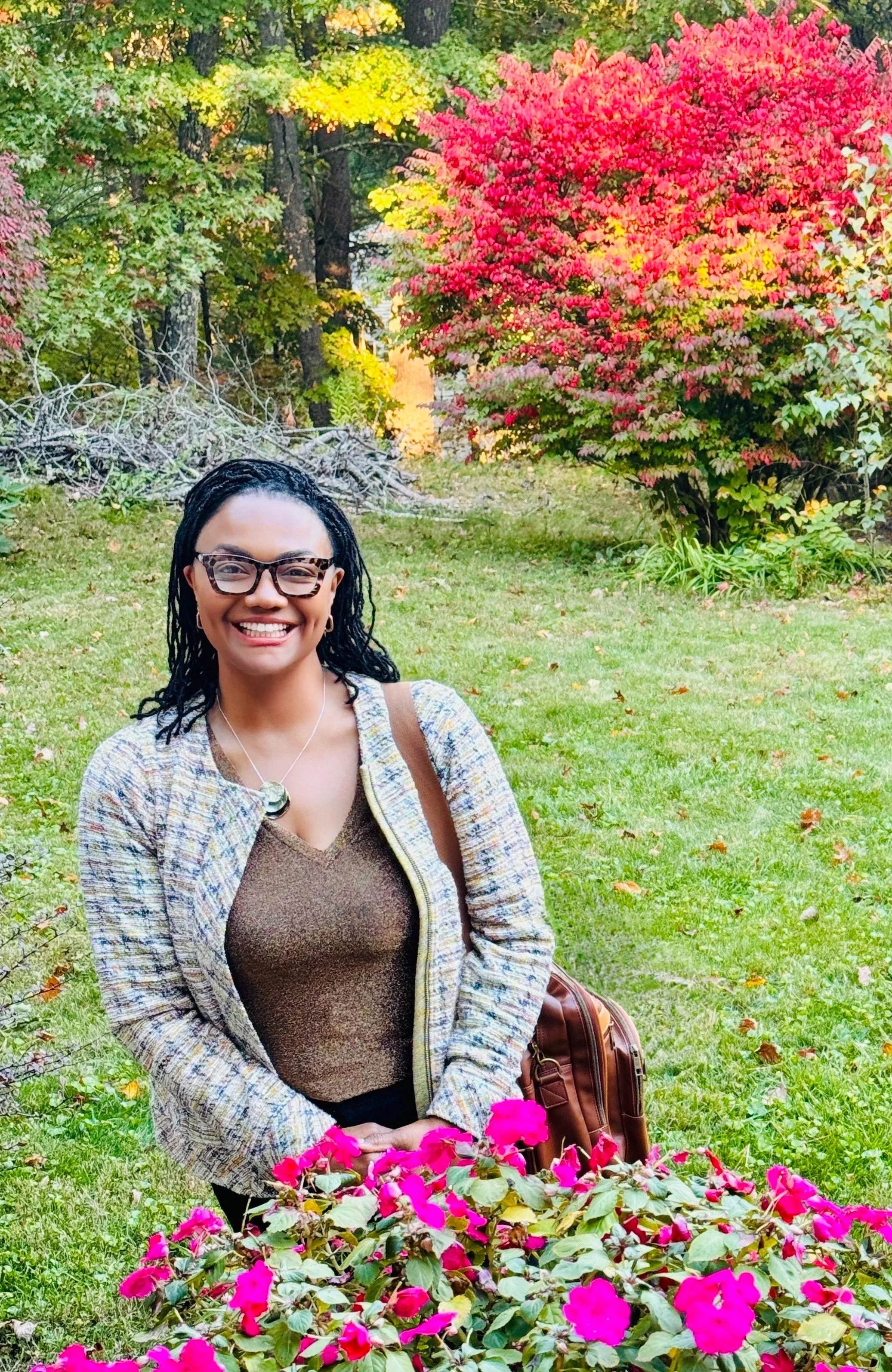 Professional portrait of Michelle Courtney Berry, known as The Workplace Doc™, welcoming organizational inquiries for keynotes, trust diagnoses, and leadership strategy consulting.