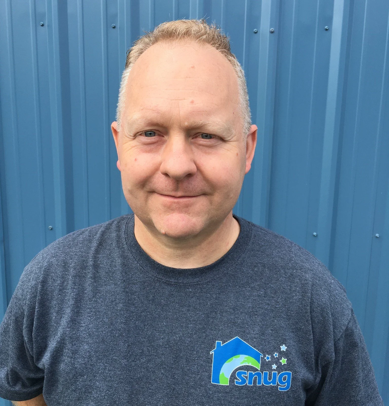 Close-up portrait of business owner Jon Harrod, showcasing the enhanced health, energy, and corporate growth generated through The Workplace Doc private advisory coaching.