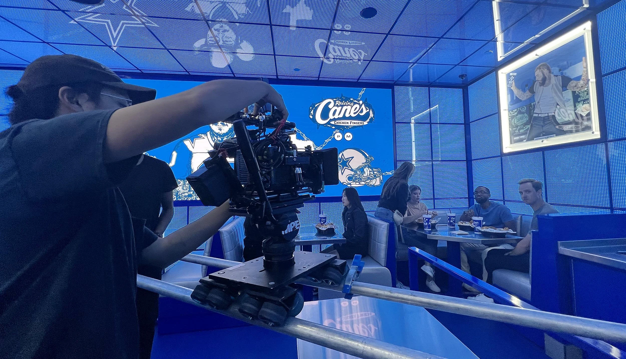 Getting video of people sitting at a Cane's restaurant in Dallas