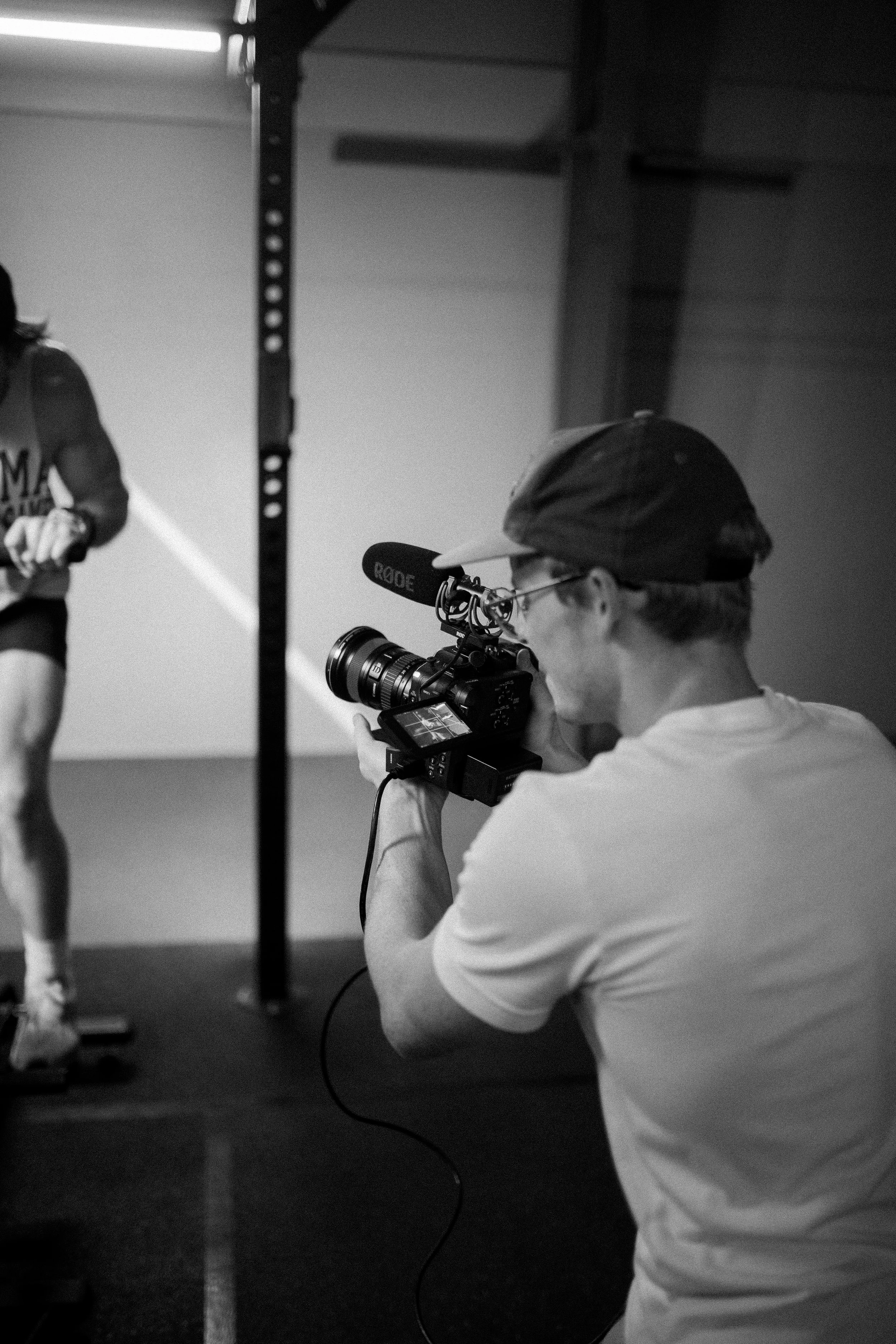 Andrew Stone Photography filming man riding exercise bike.