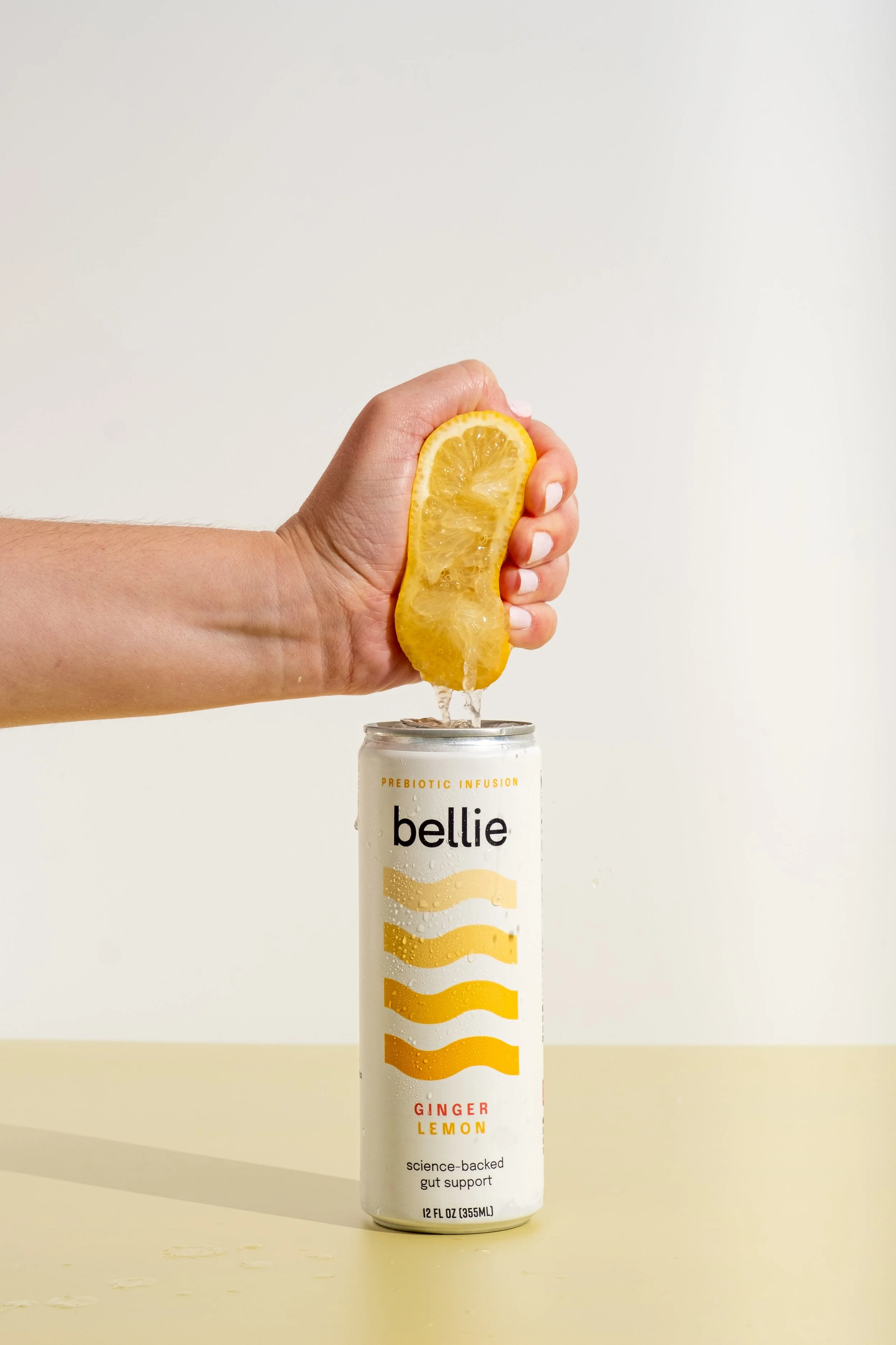 Lemon squeezing into Bellie can