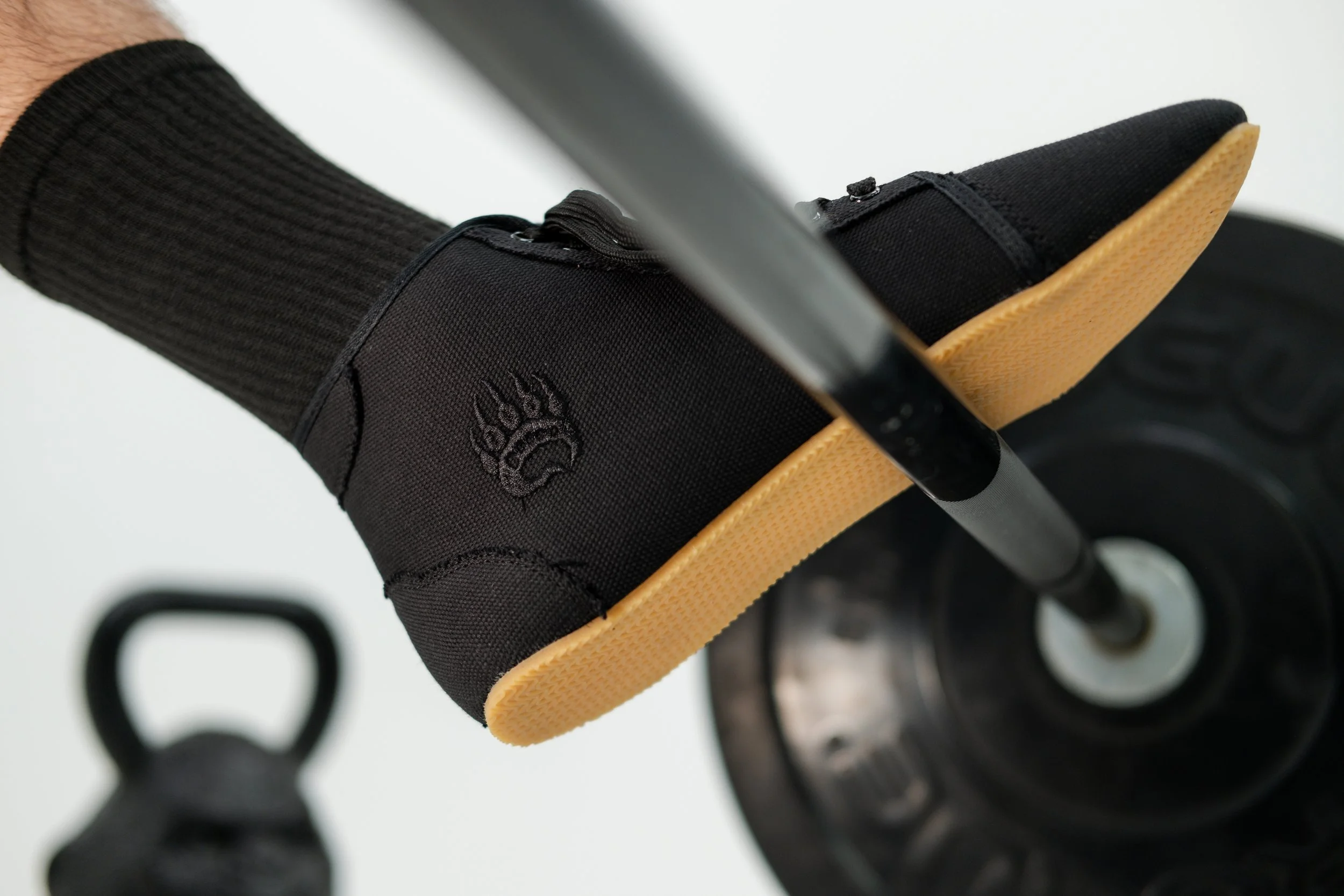 Bearfoot shoes on barbell