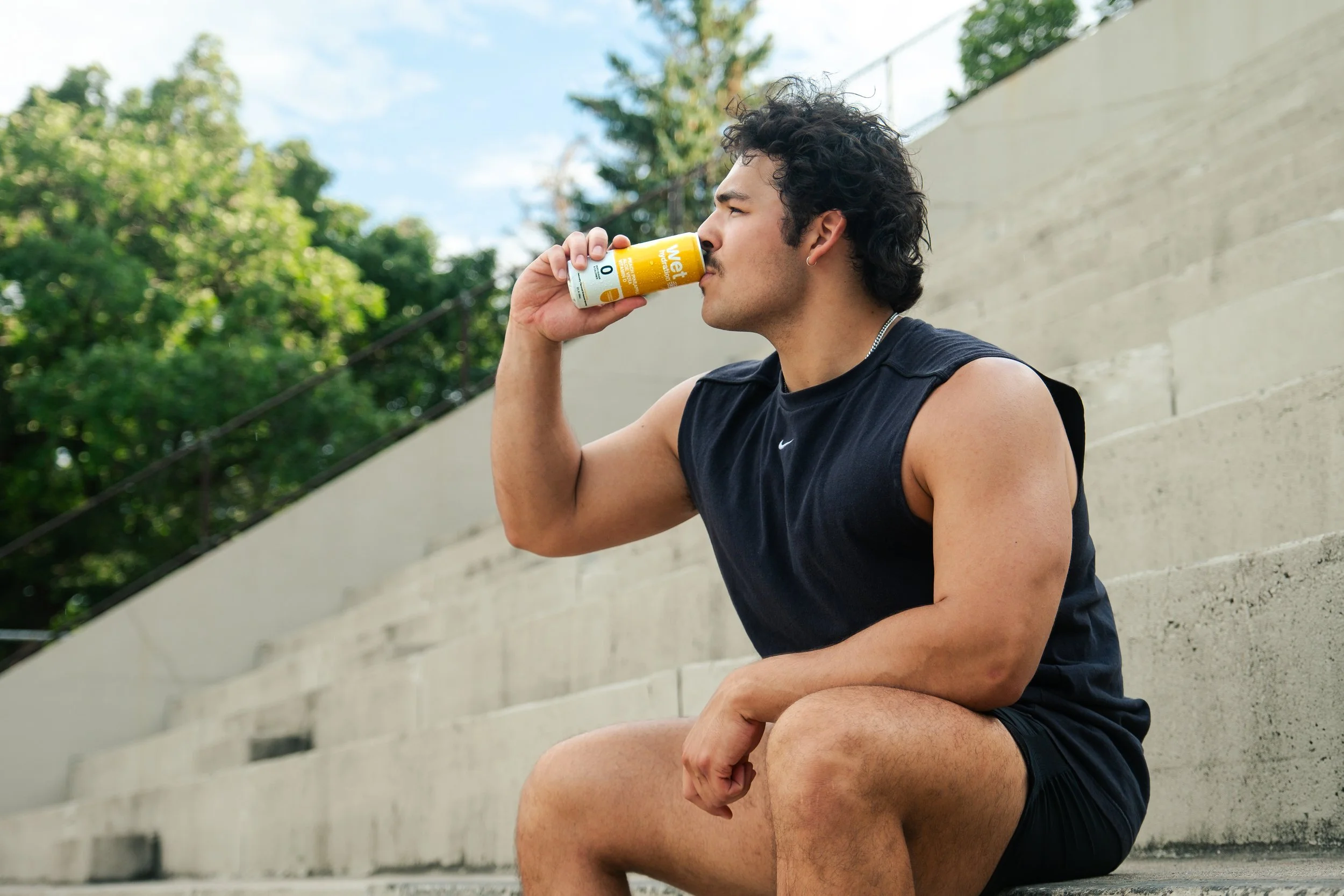 Man drinking hydration drink