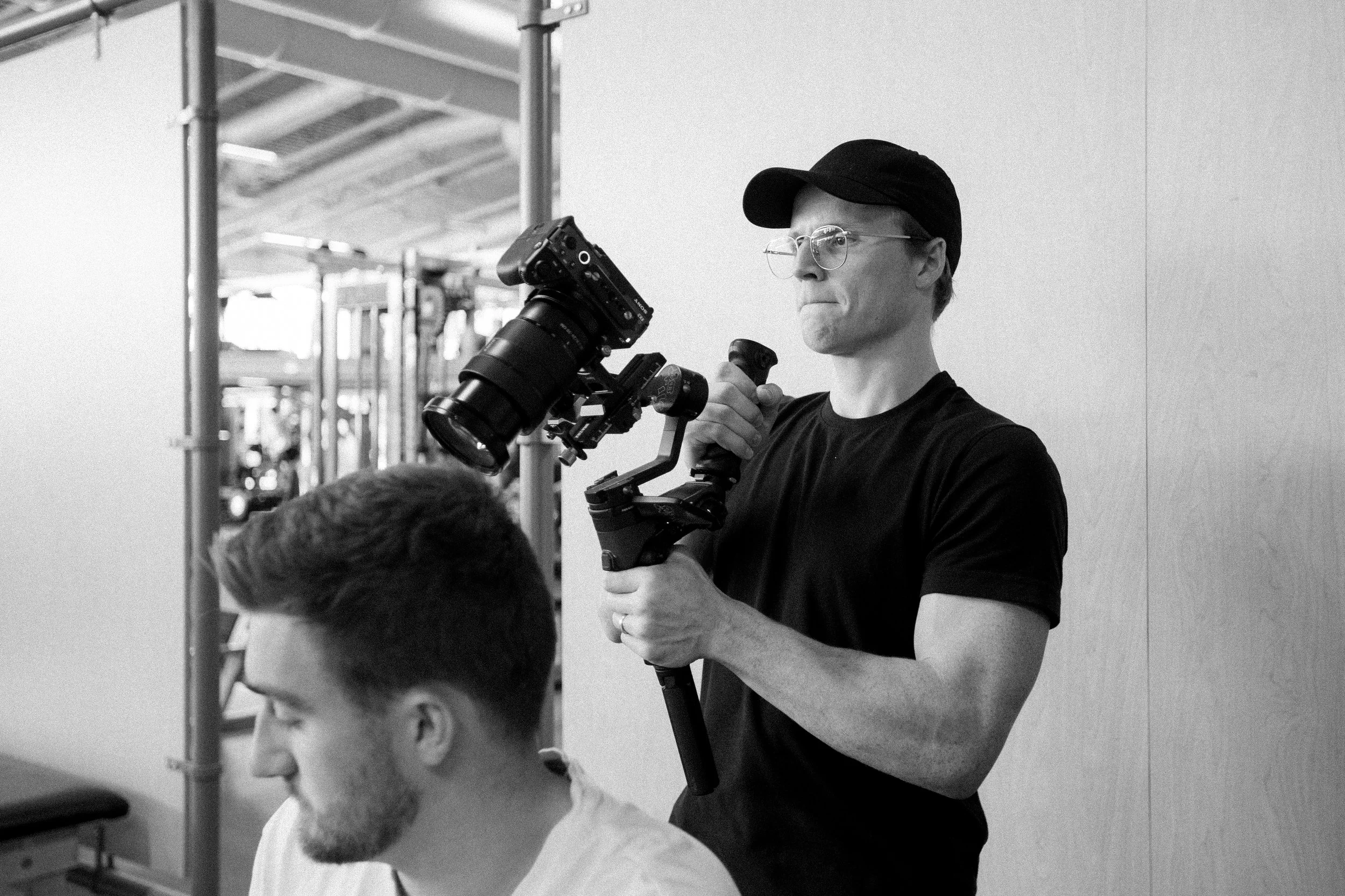 Andrew Stone filming with camera on a gimbal.