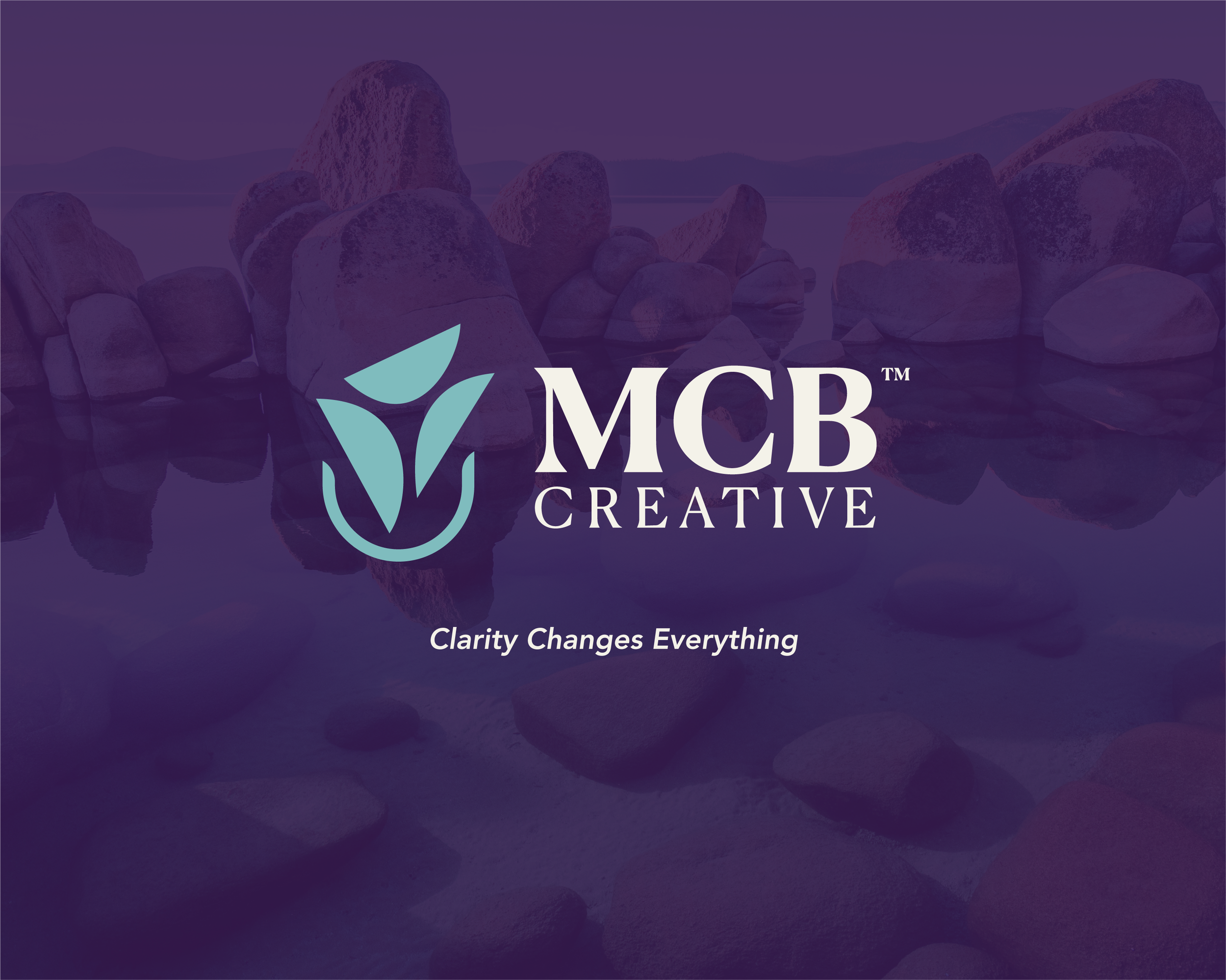 MCB Creative logo design and brand identity displayed over a tranquil lakeside landscape with the tagline "Clarity Changes Everything."
