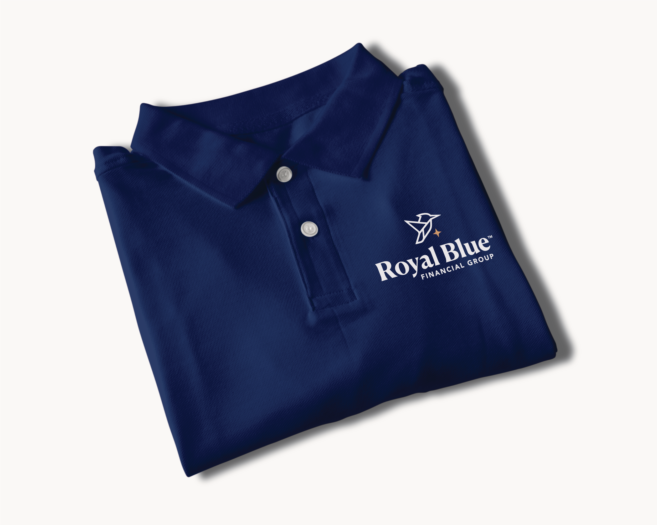 Royal Blue Financial Group branded navy polo shirt featuring the embroidered logo and premium corporate apparel design.