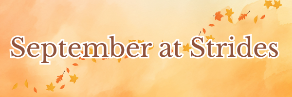 September at Strides Riding Academy newsletter banner with autumn leaves background.