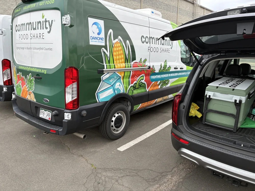Food-share delivery vehicles at Drop 38