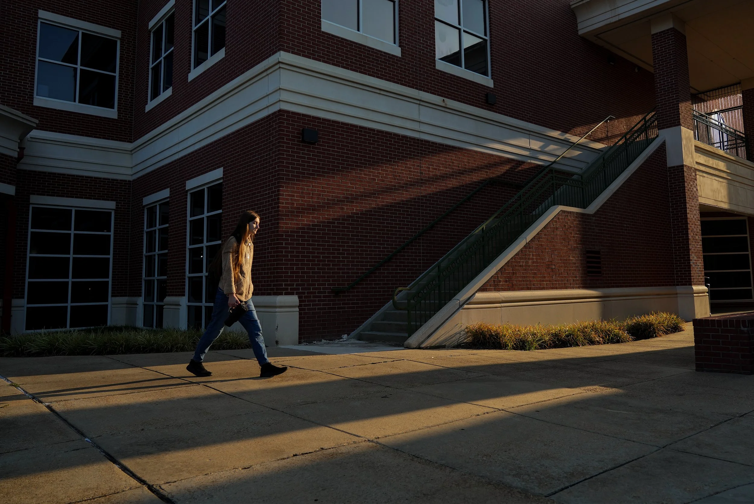  Danielle Ringuette, an 18-year-old studying creative writing and traditional art, walks across campus at Belhaven University in Jackson, Miss., on Sept. 9, 2025. [Clarion Ledger] 