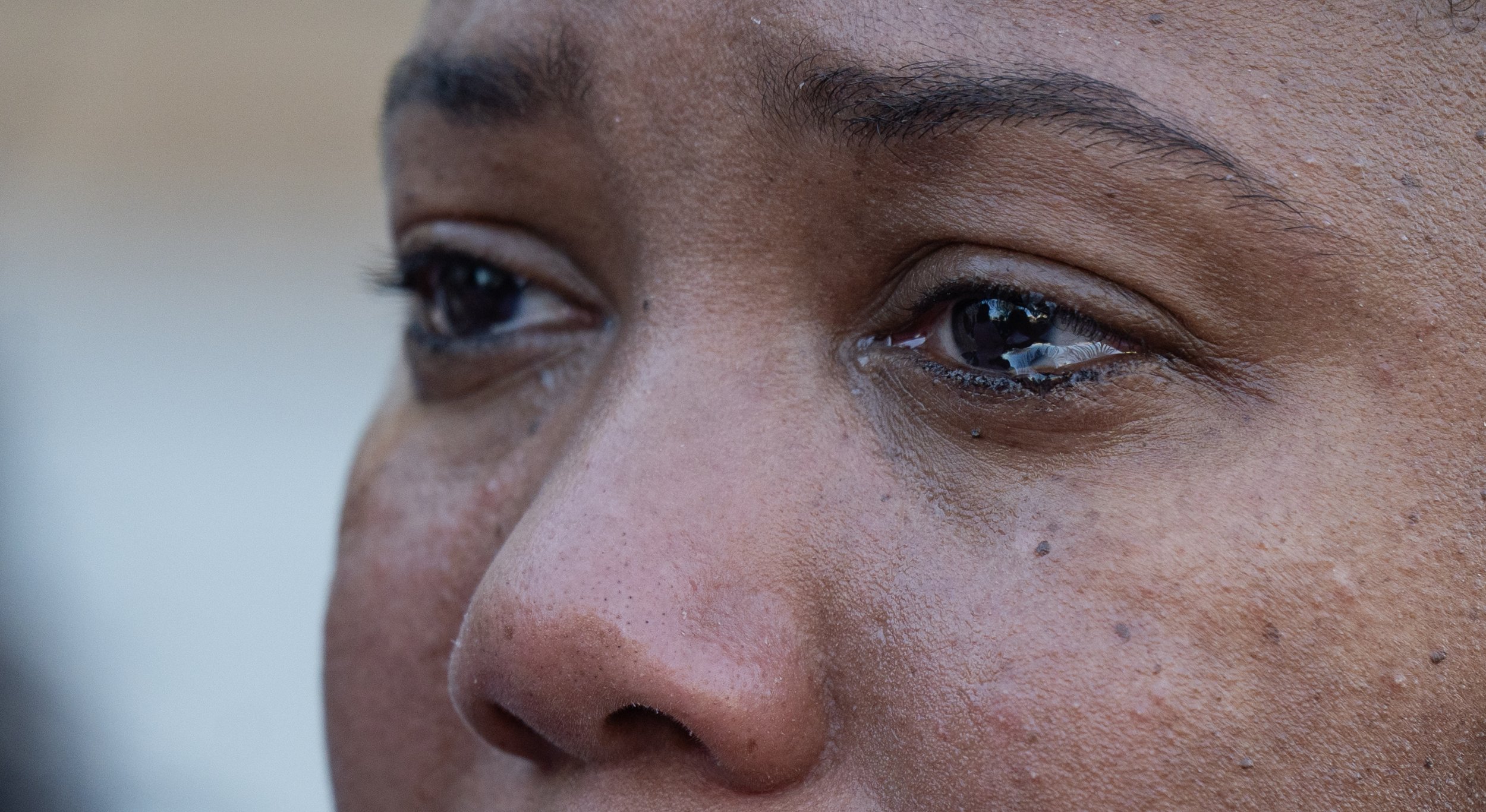  Katrina Dortch, Carlos Collins' cousin, cries outside the Hinds County Courthouse after Marcus Johnson was found guilty by the jury of murdering Collins on day three of the trial in Jackson, Miss., on Feb. 12, 2026. "He will be truly missed," Dortch