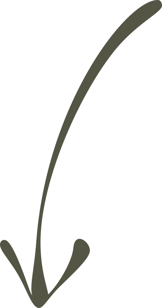 A person is sitting on the steps of a building, reading a book.