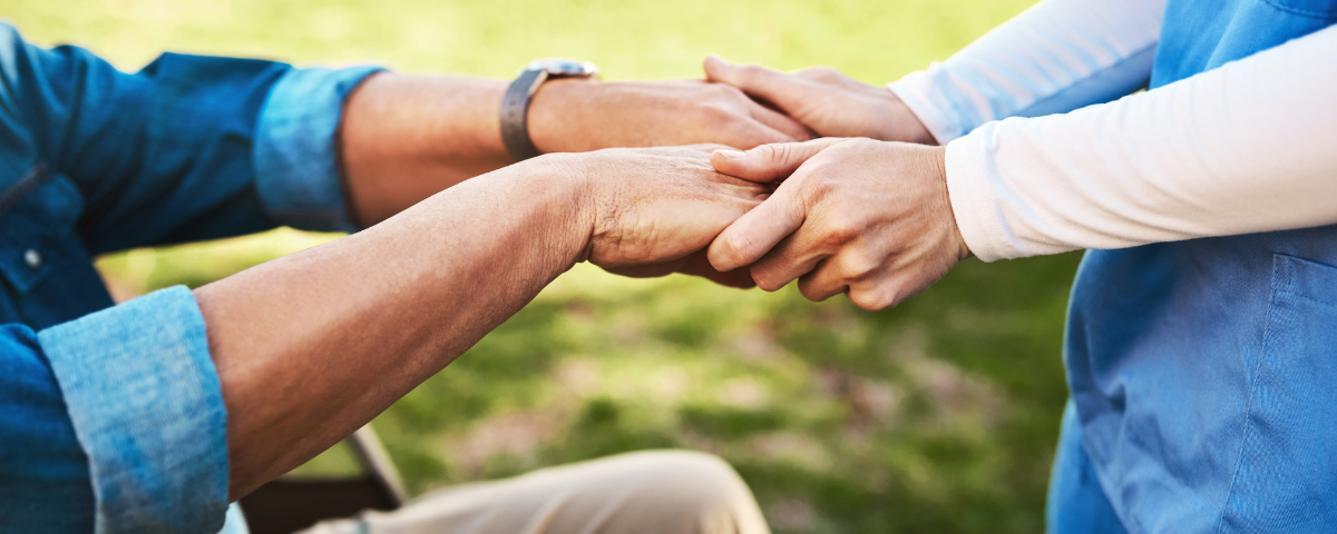 people holding hand of senior adult outside in bremerton, washington