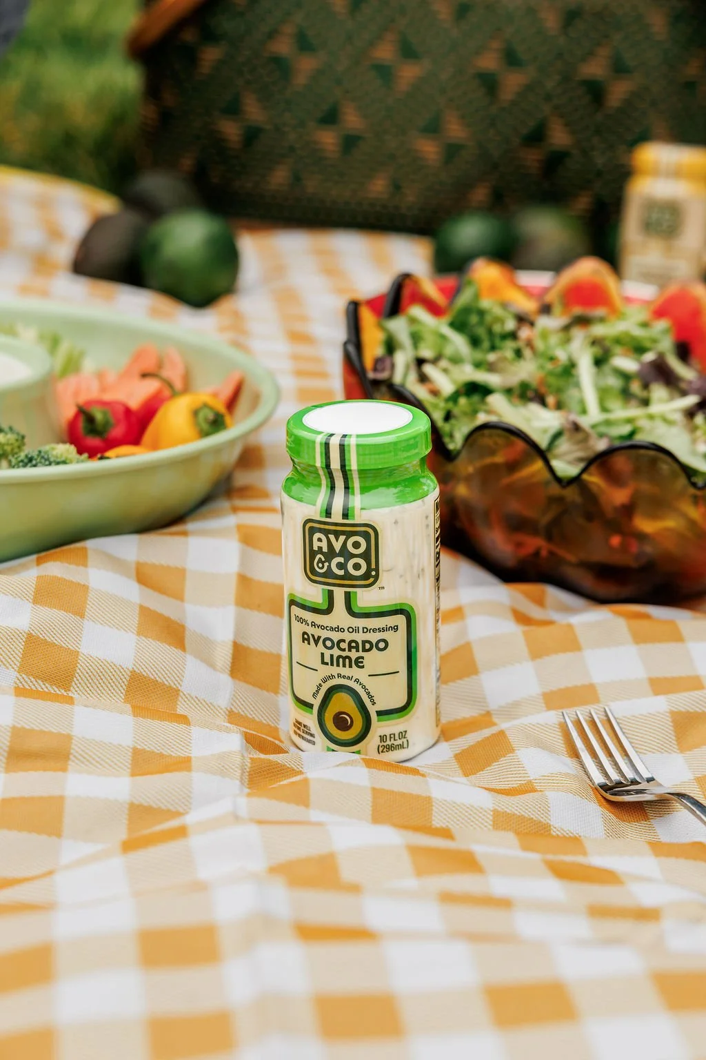 product photography for a salad dressing brand in a staged picnic