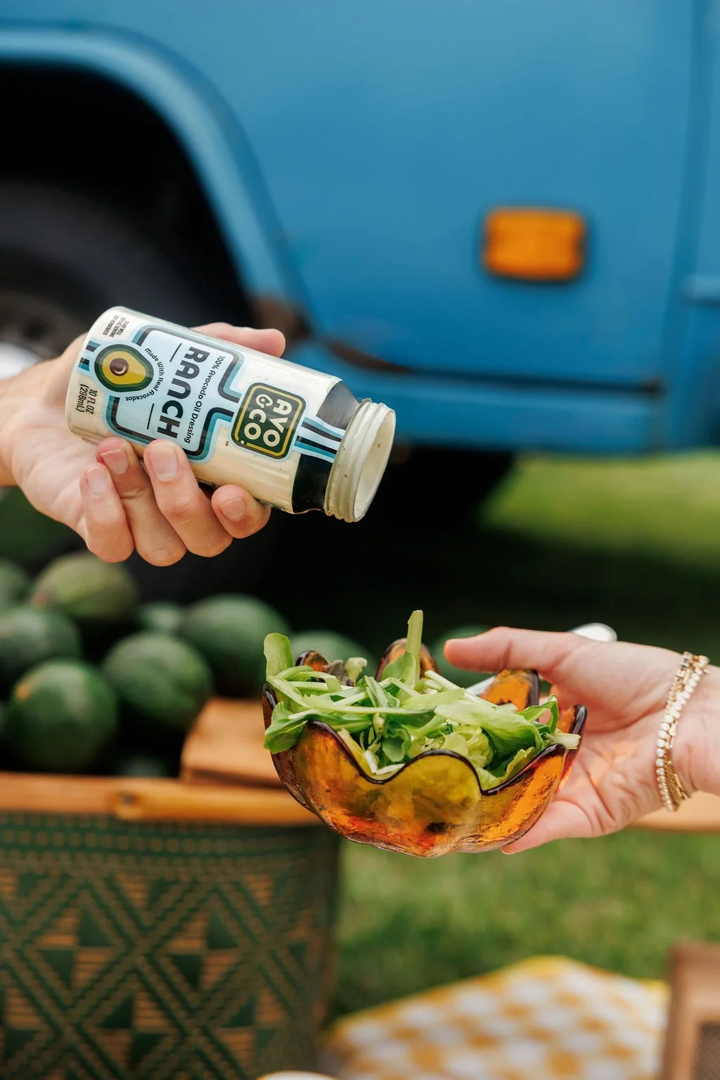 product photography for a salad dressing brand in a staged picnic