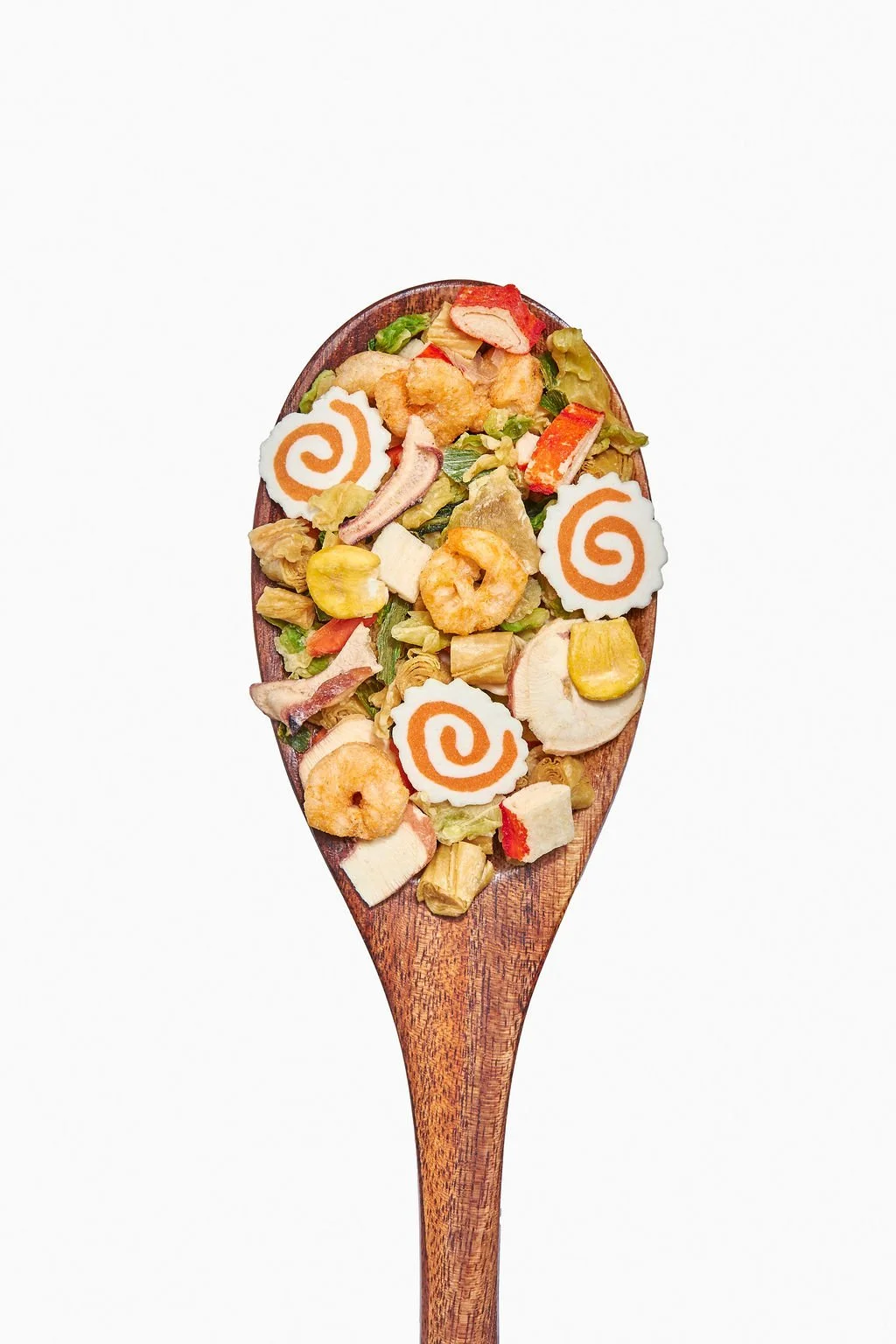 A spoon showing off ingredients of a food product for new product launch imagery