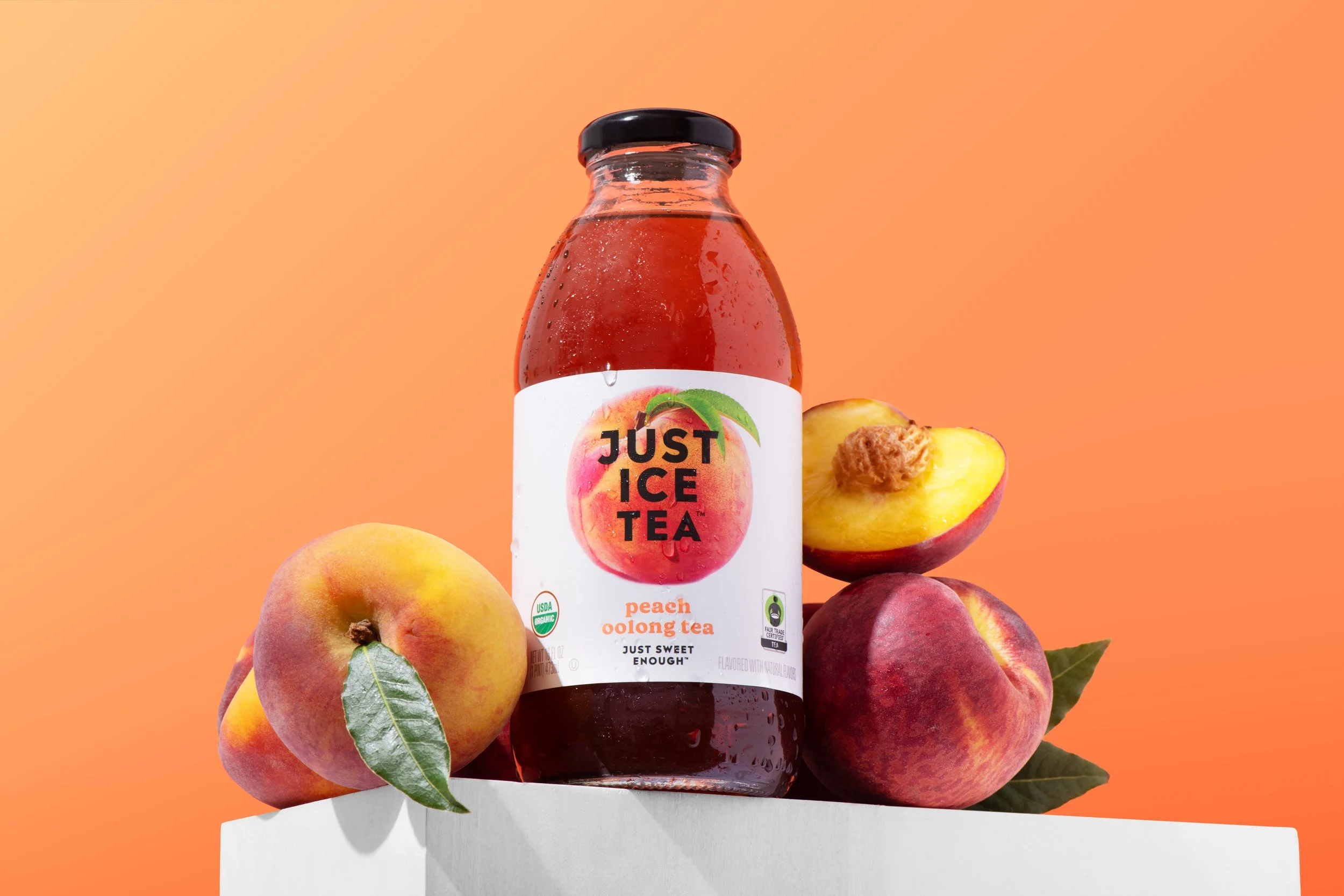 A hero image of a Just Ice Tea bottle from a brand photoshoot