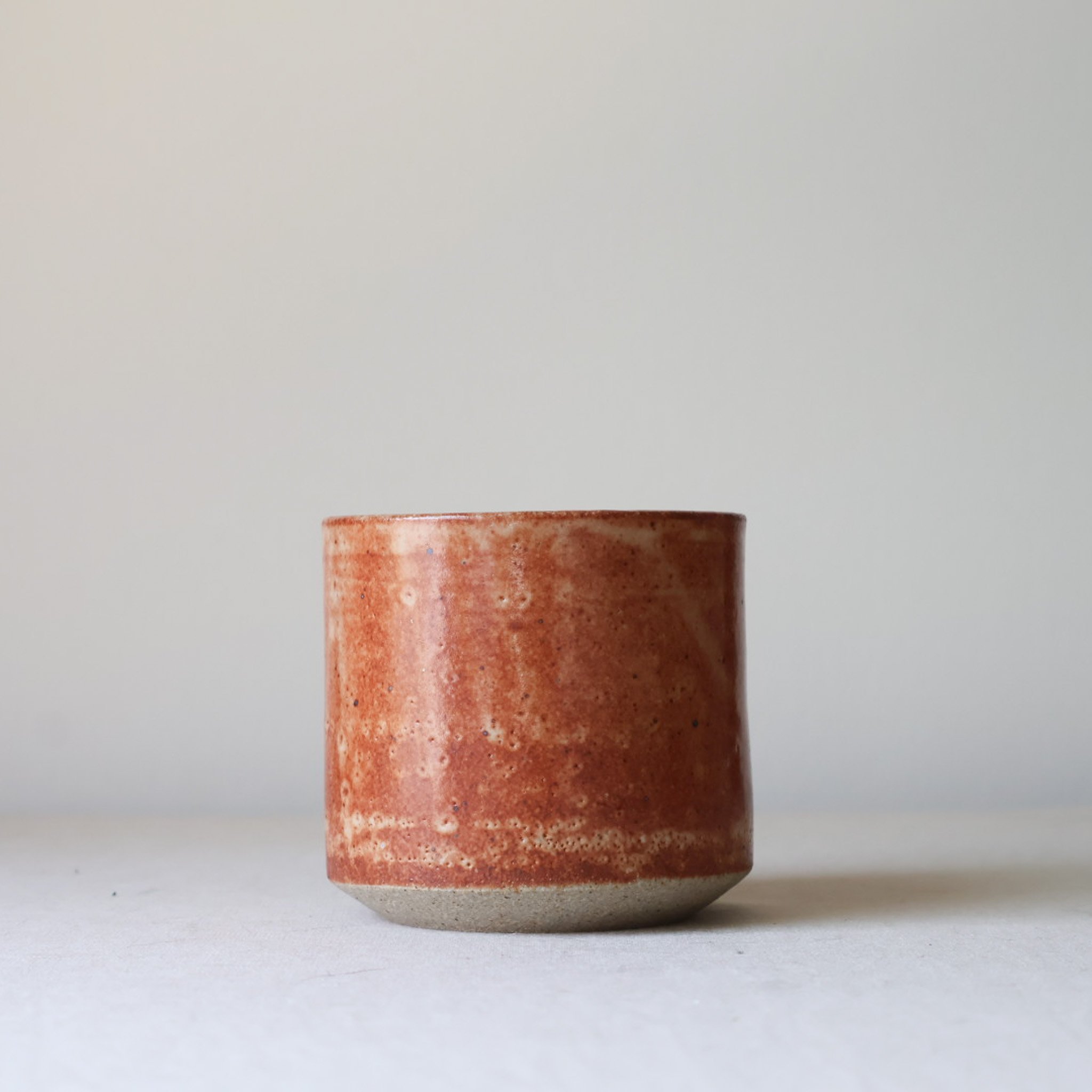 rusty-shino-iron-speckle-tumbler-1.jpg
