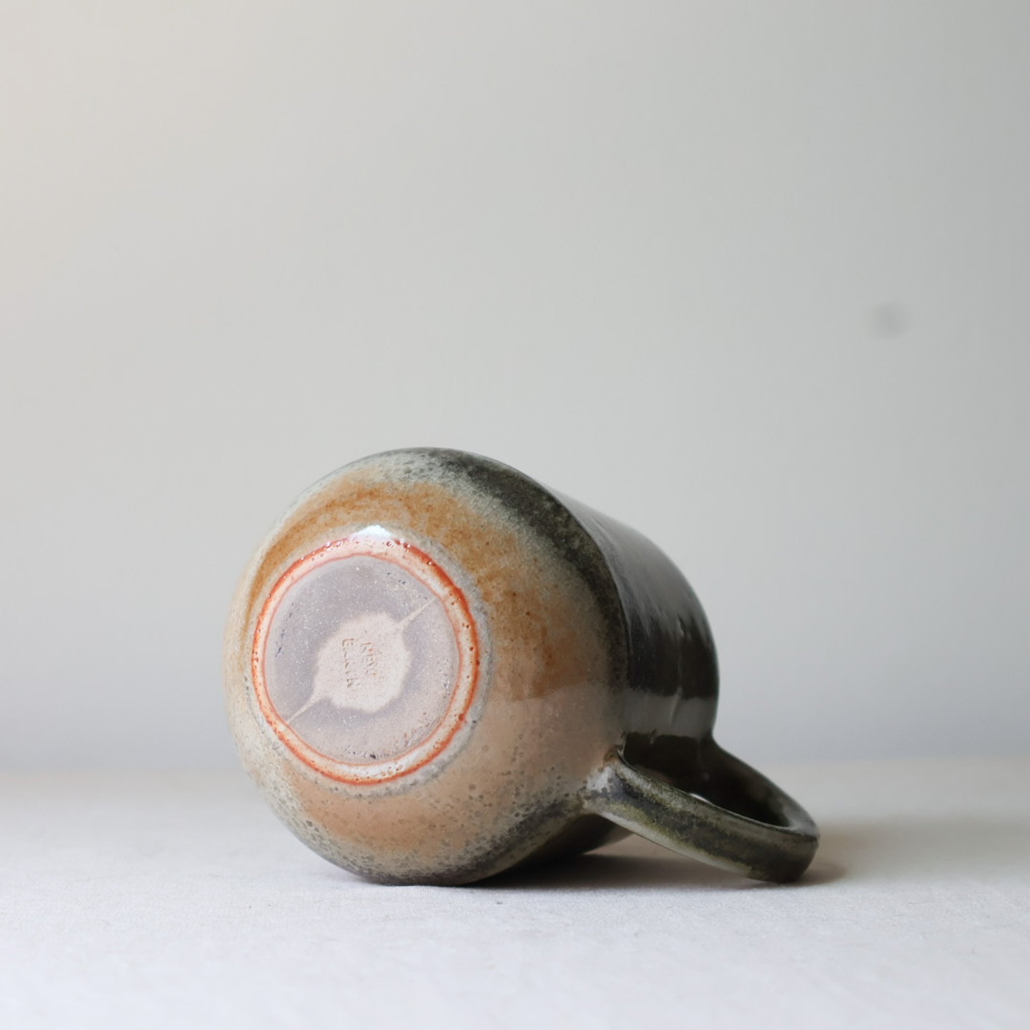 gray-green-shino-mug-prototype-3.jpg