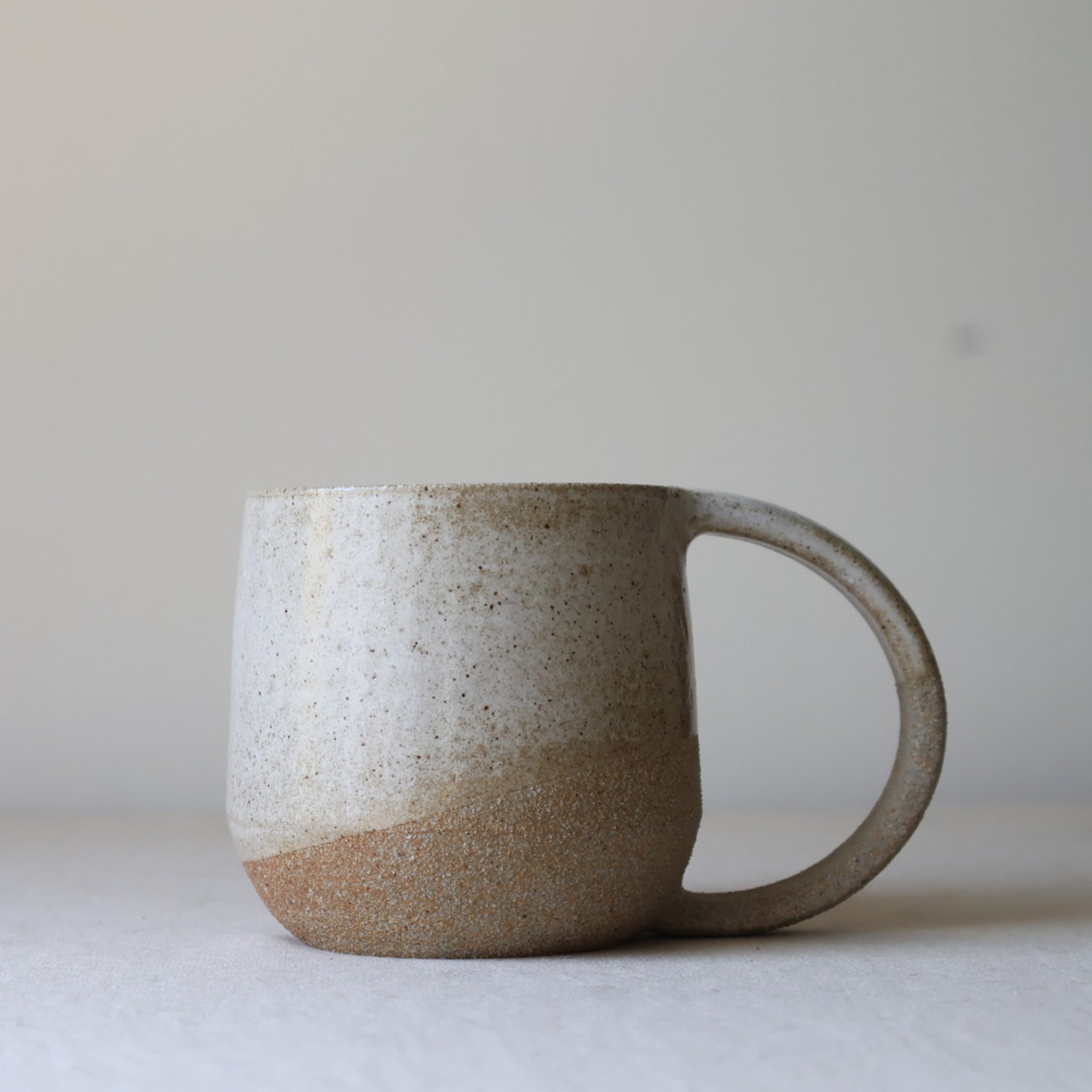 glossy-white-speckled-mug-2.jpg