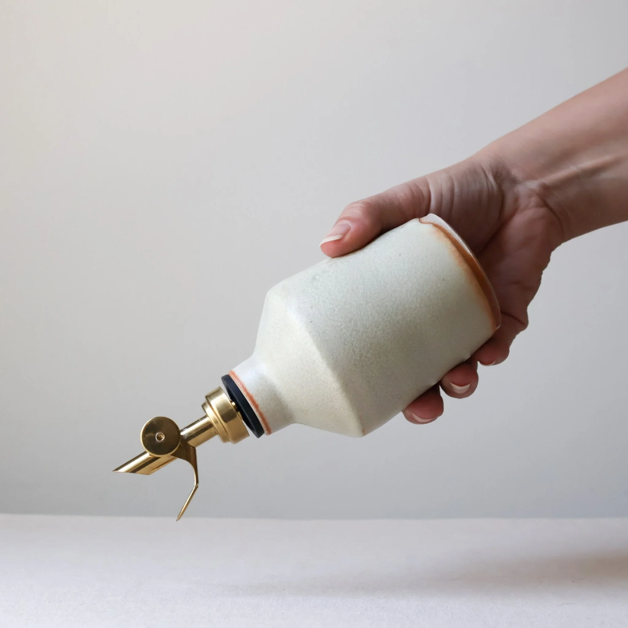 metallic-cream-oil-bottle-2.jpg