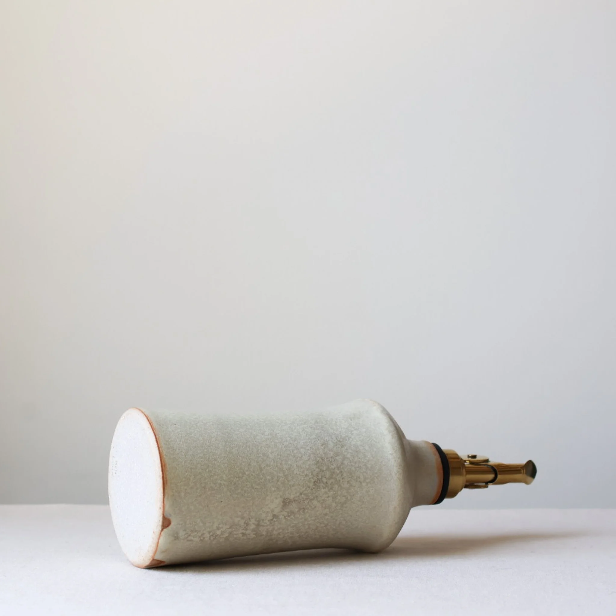 metallic-cream-taper-oil-bottle-3.jpg
