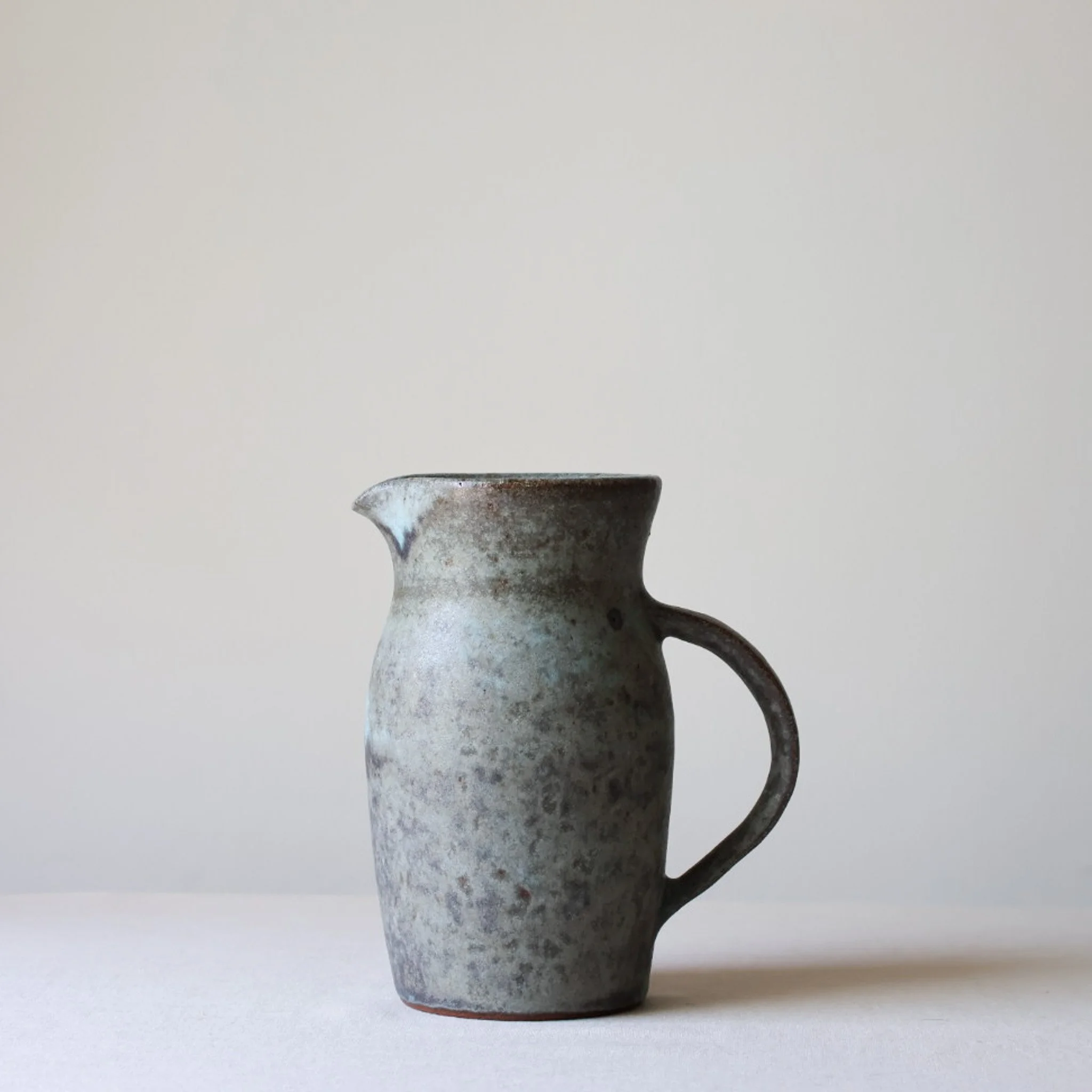 iron-turquoise-water-pitcher-1.jpg