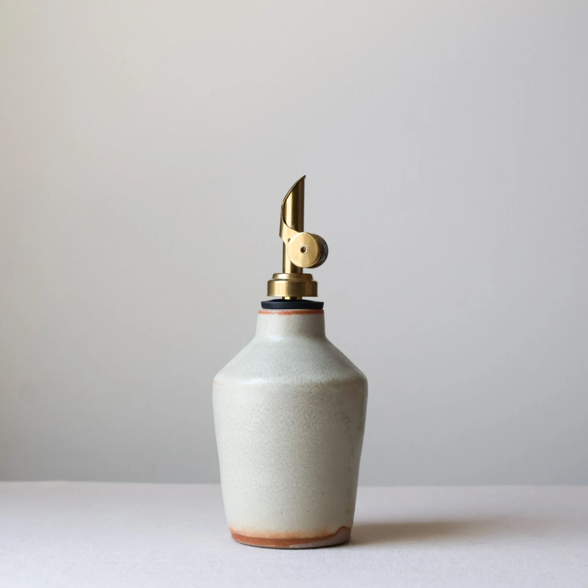 metallic-cream-oil-bottle-1.jpg