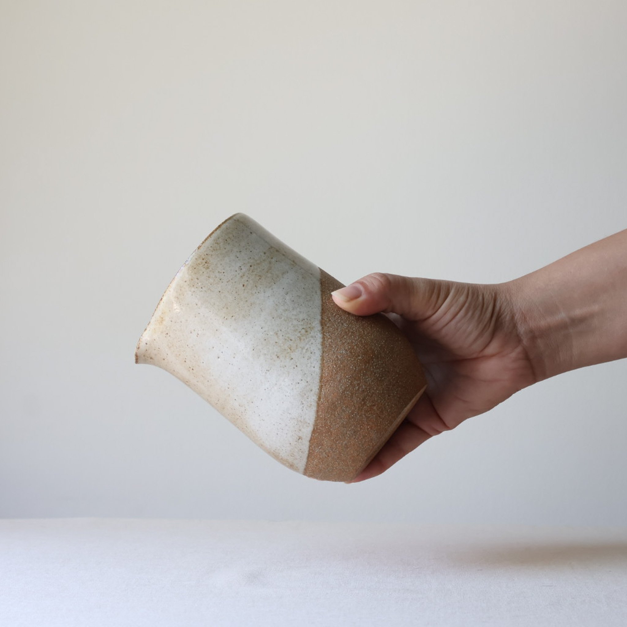 warm-white-handleless-pitcher-2.jpg