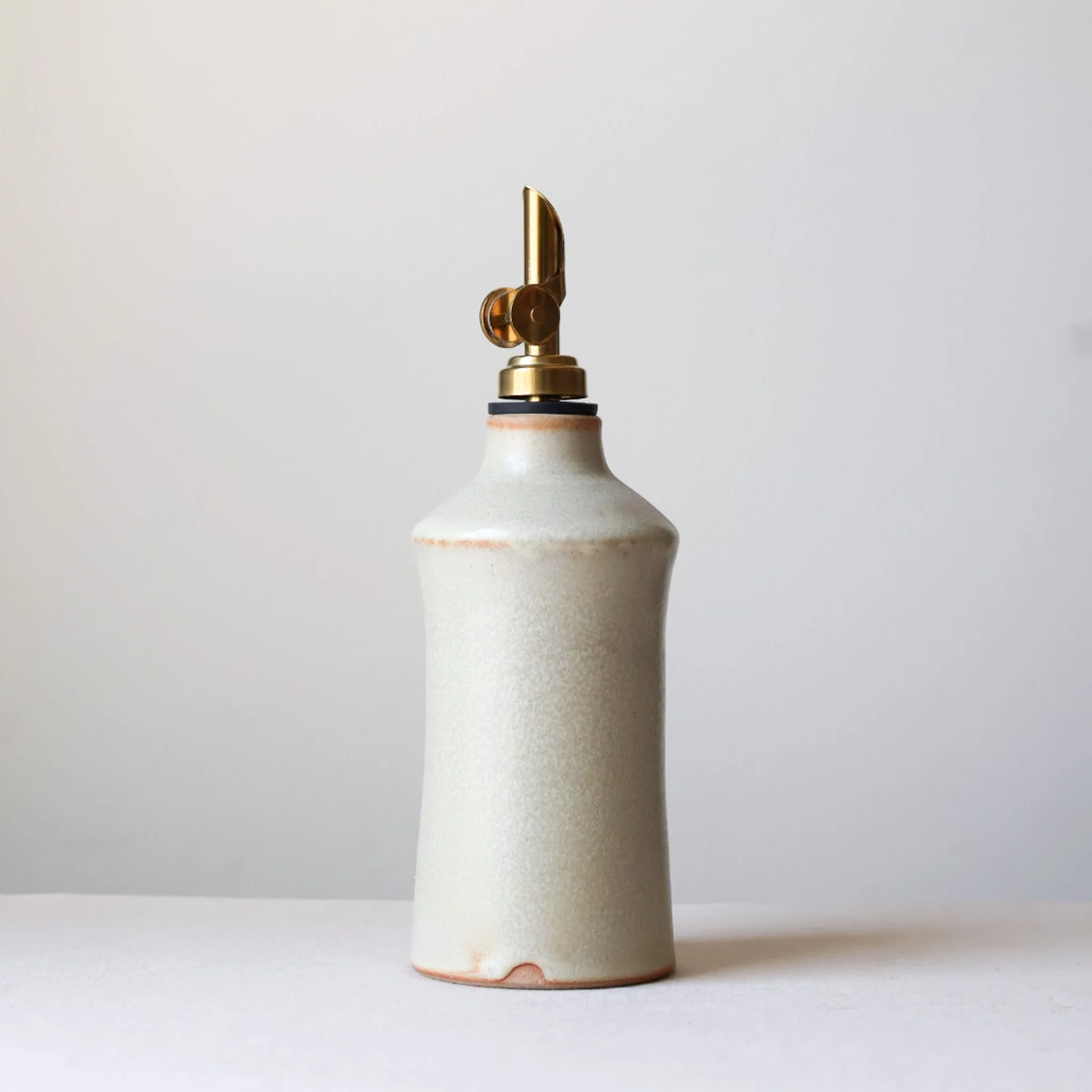 metallic-cream-taper-oil-bottle-1.jpg