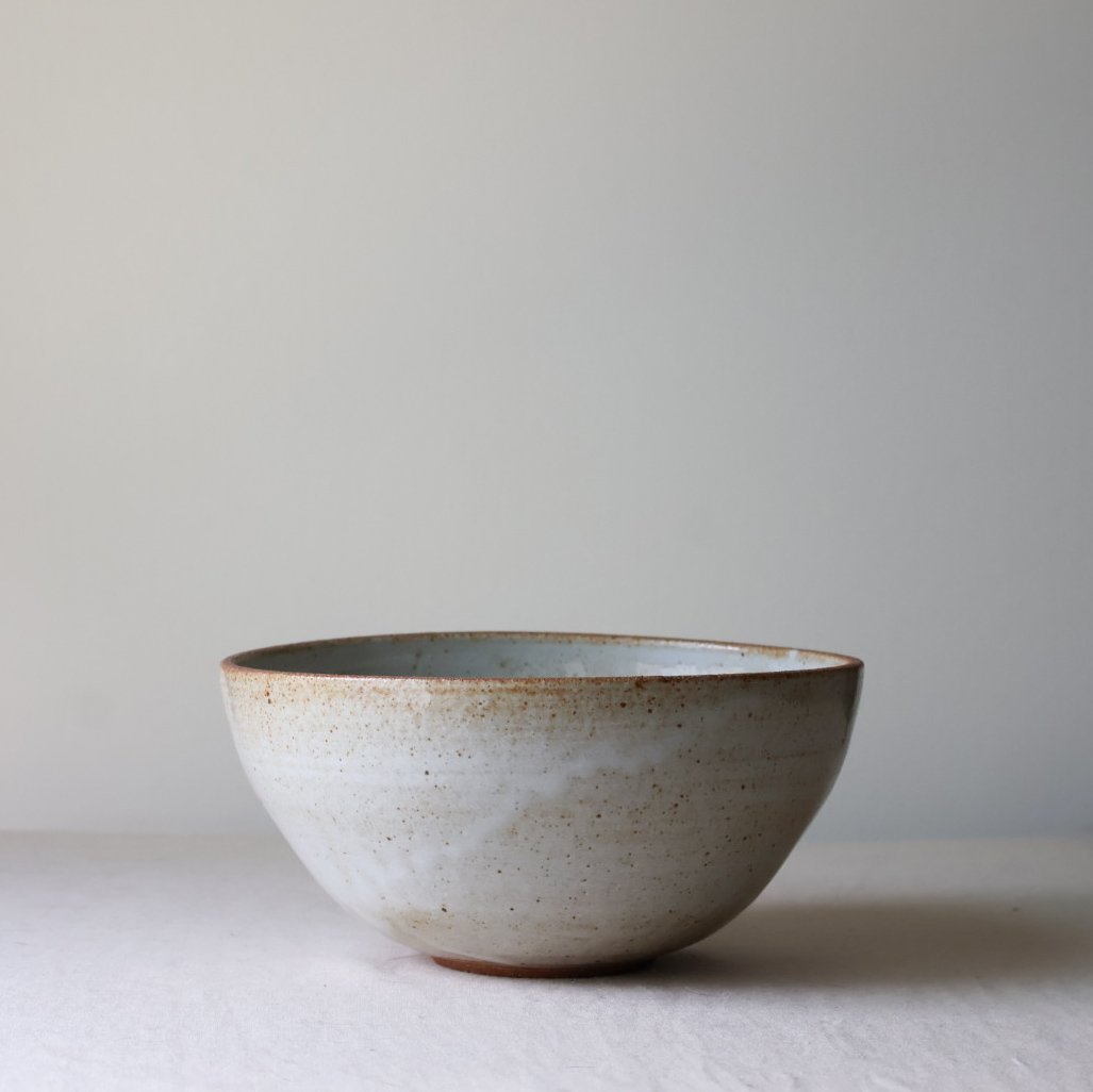 glossy-white-iron-speckle-serving-bowl-1.jpg